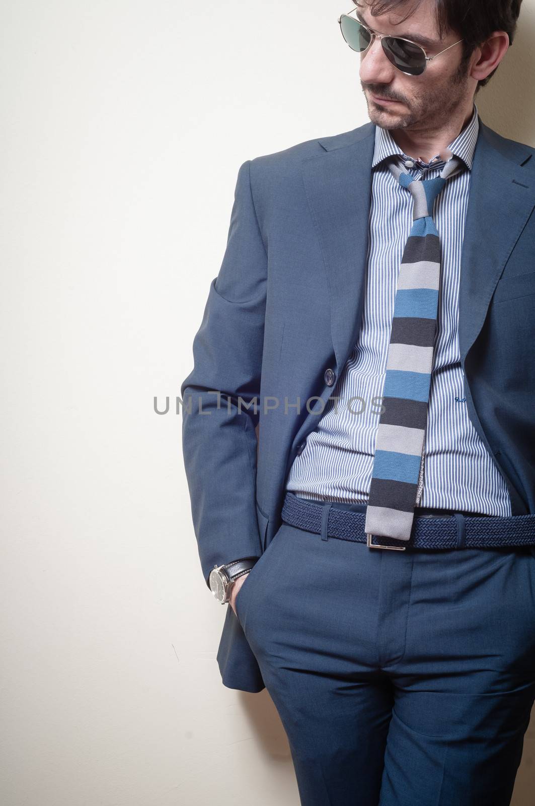 businessman stylish fashion posing elegant on gray background