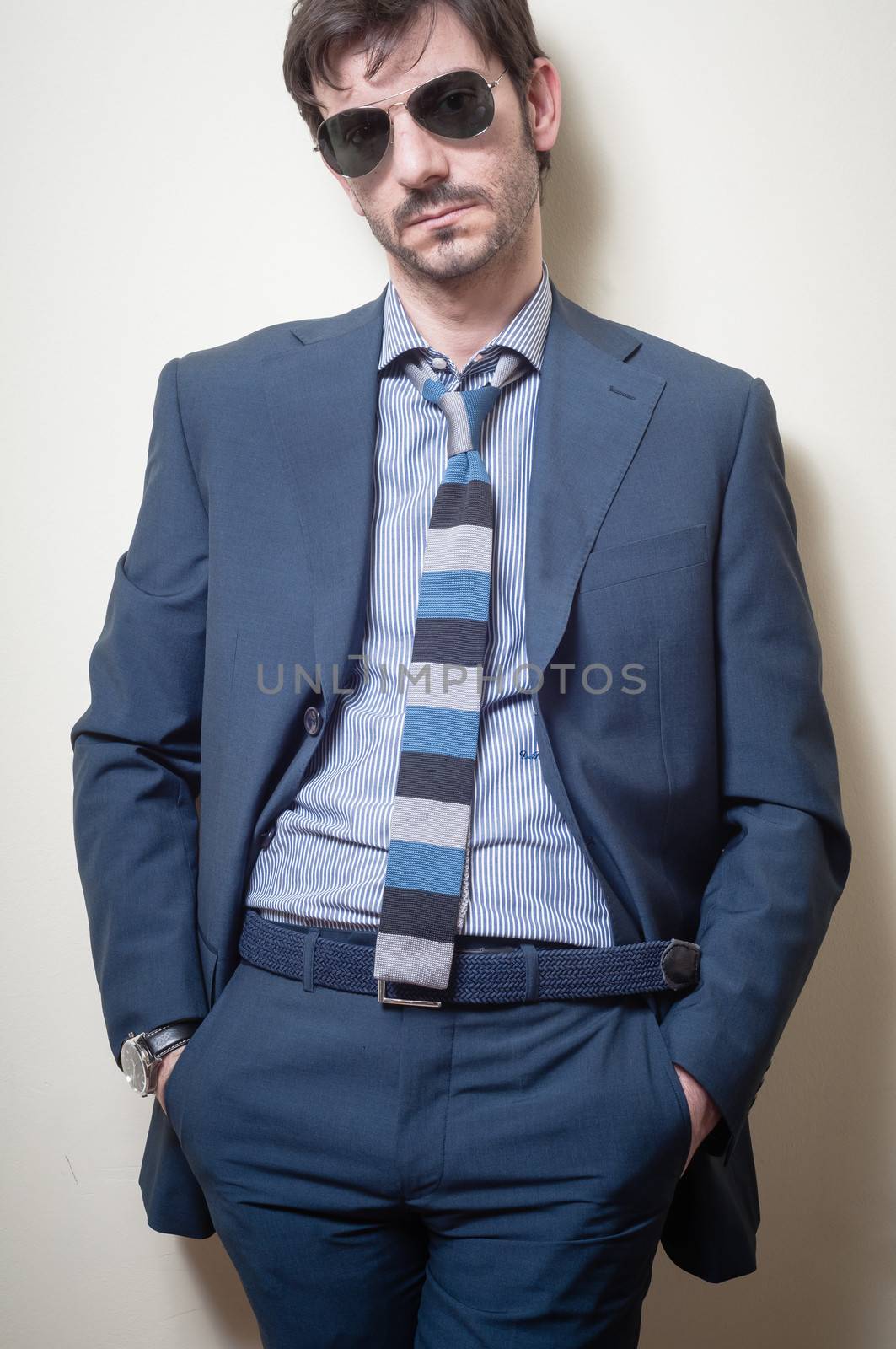 businessman stylish fashion posing elegant on gray background