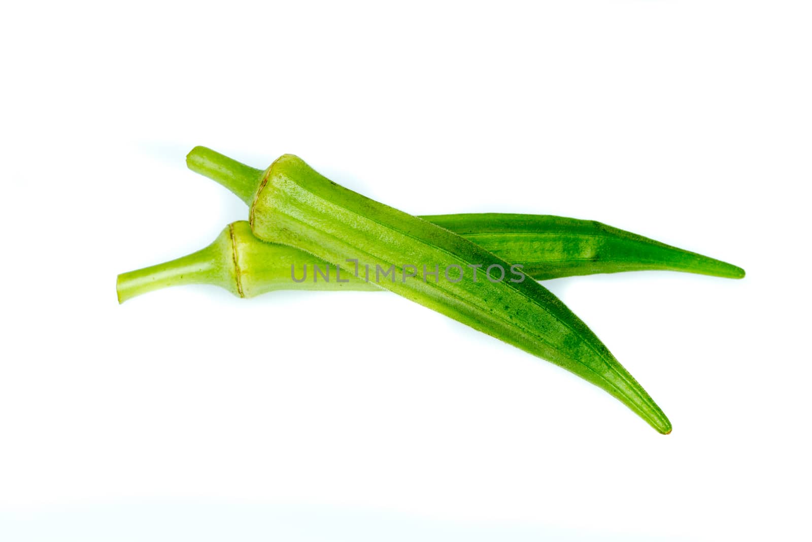 fresh green okra on white background