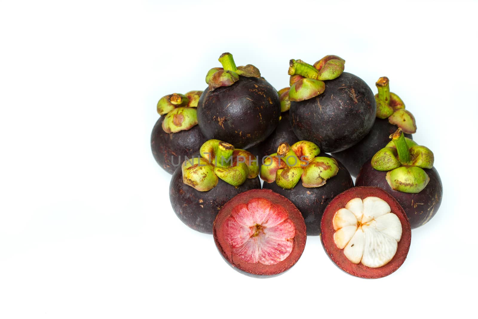 cut mangosteen white background