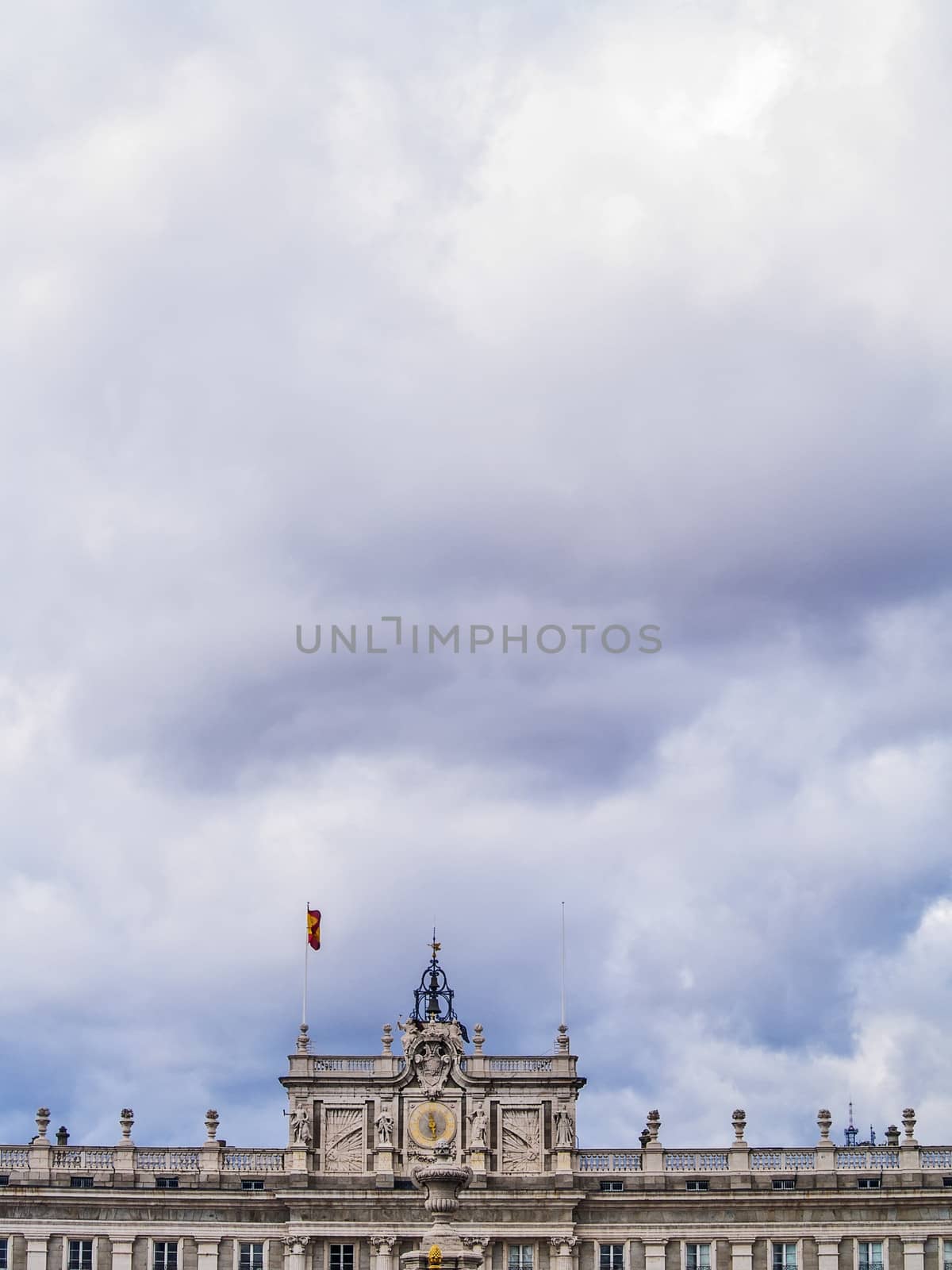 Madrid, May 2012. Cloudscape with a section of Royal Palace.