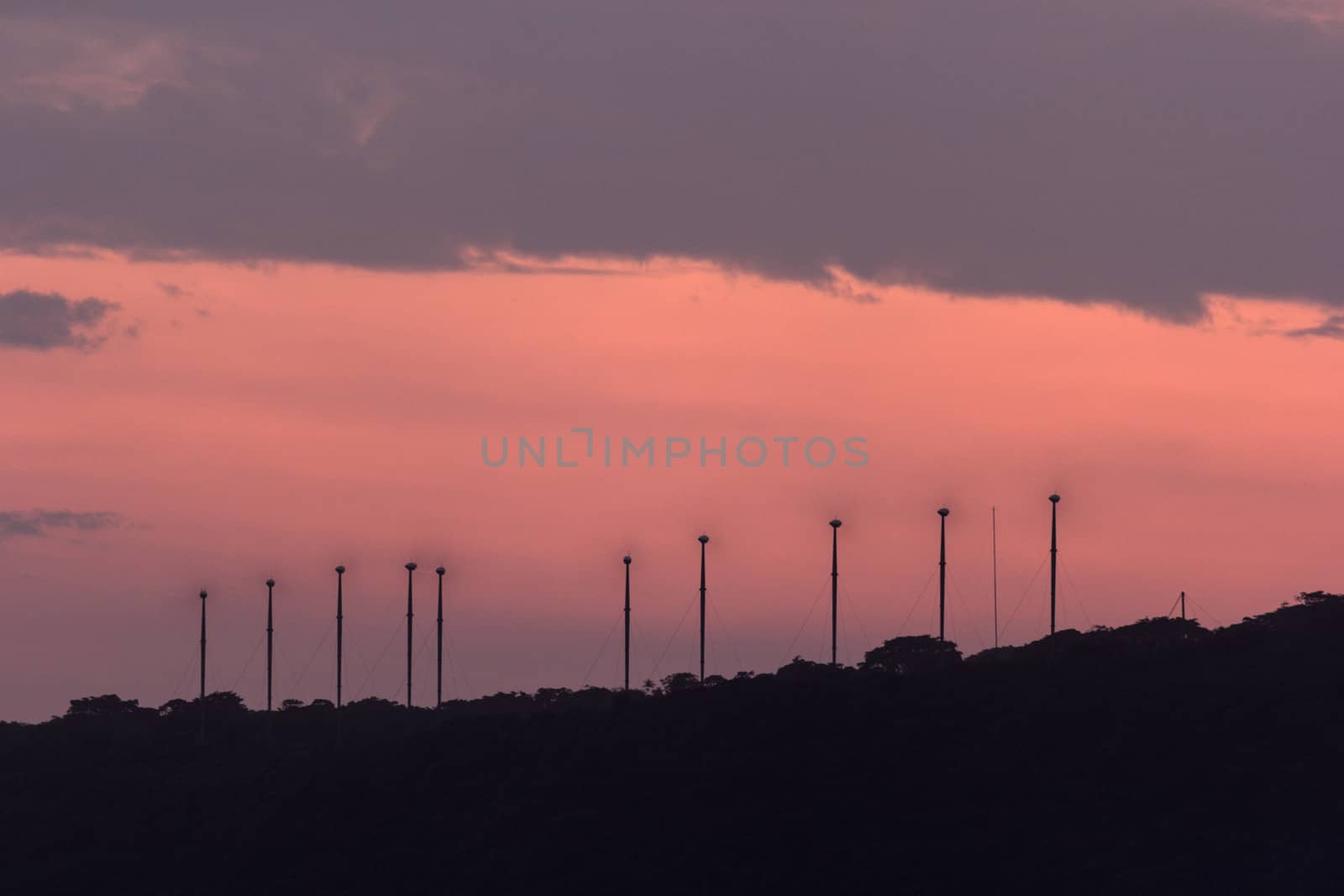 Windmills working at sunset by benkrut