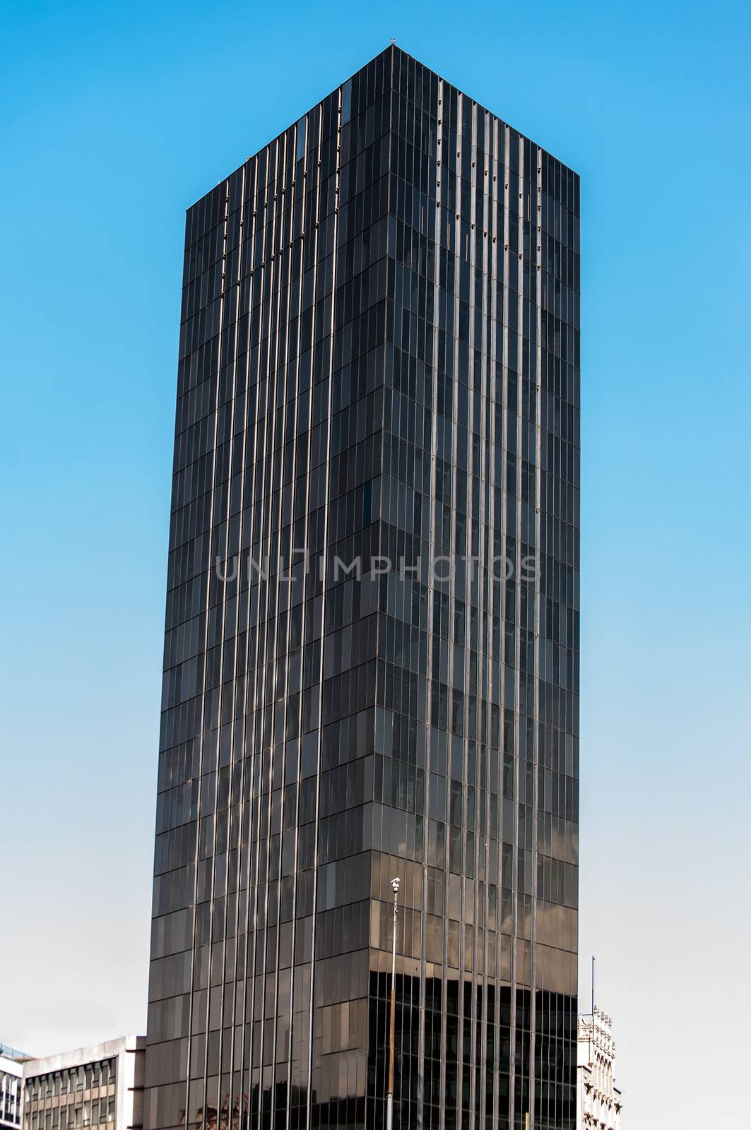 Tall black sleek looking skyscraper in Mexico City
