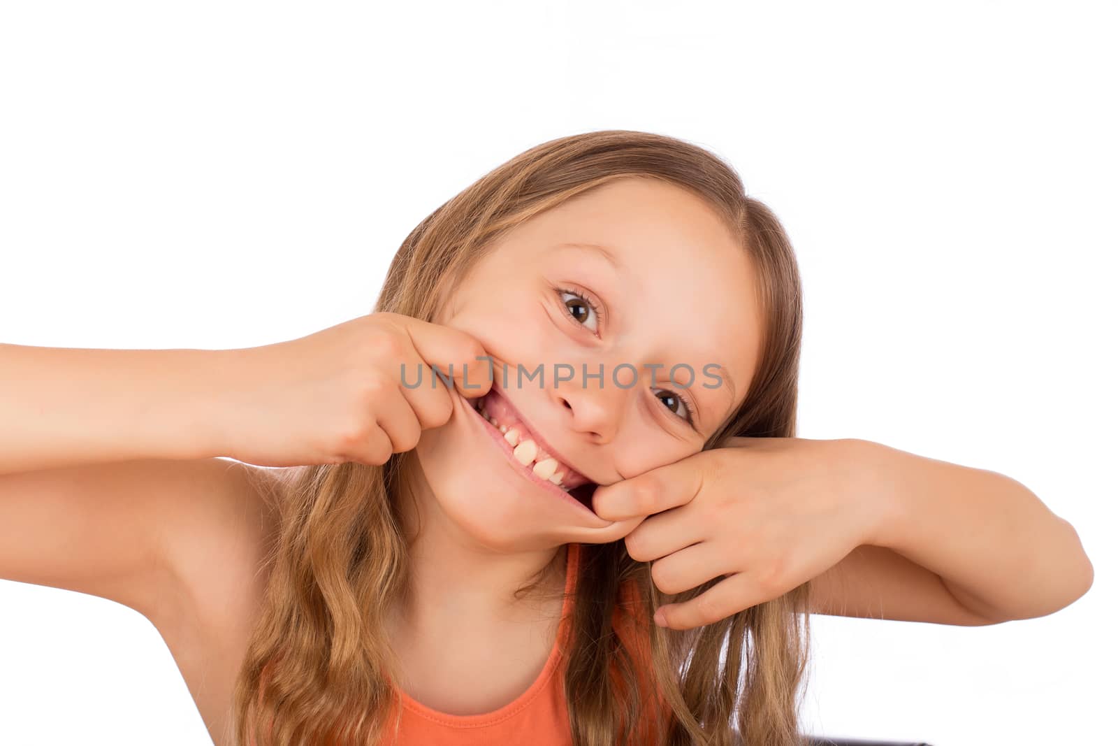 Happy girl make a grimace. Isolated on a white background.