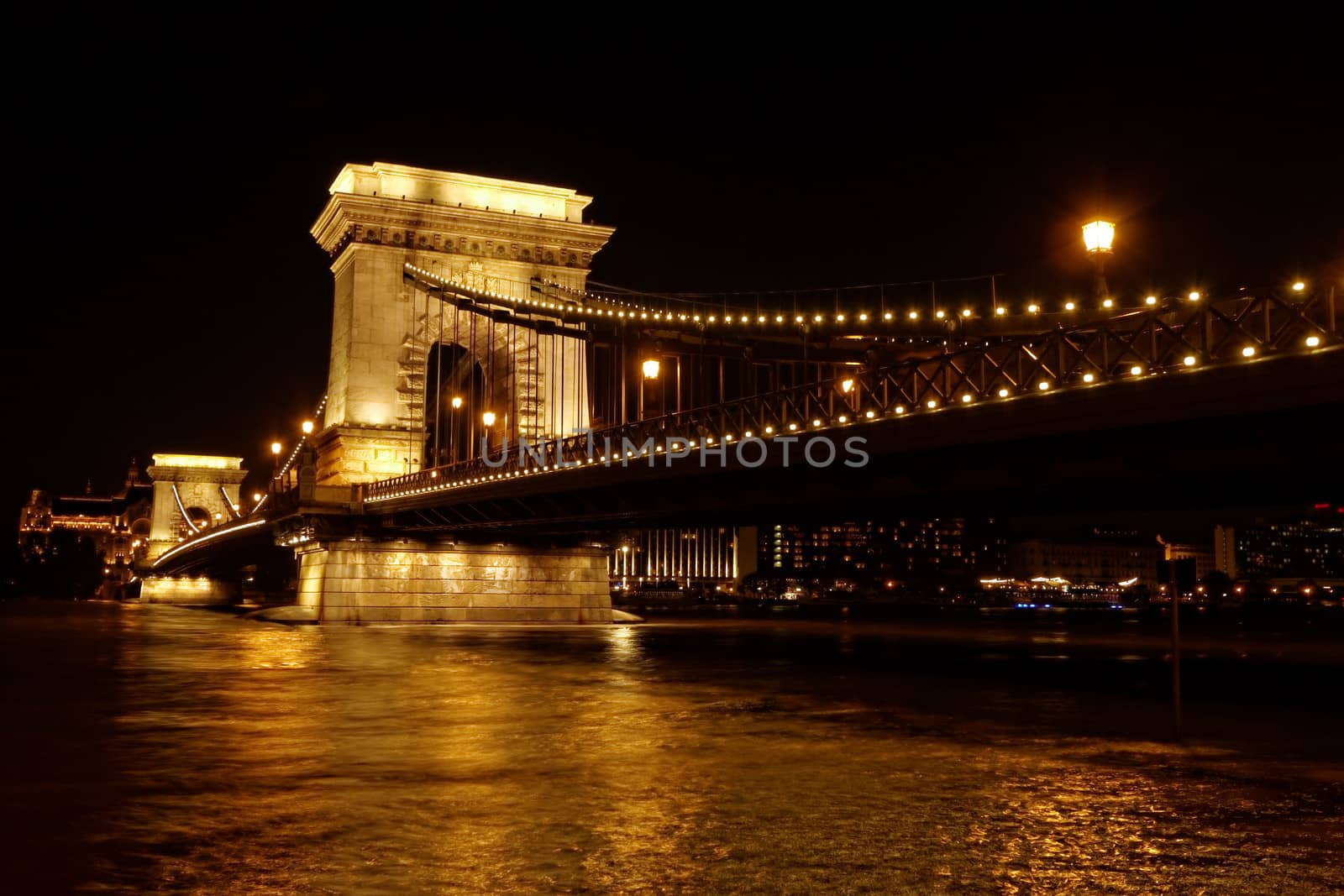 Night image with traffic of the hungarian chain Bridge extremly high donau