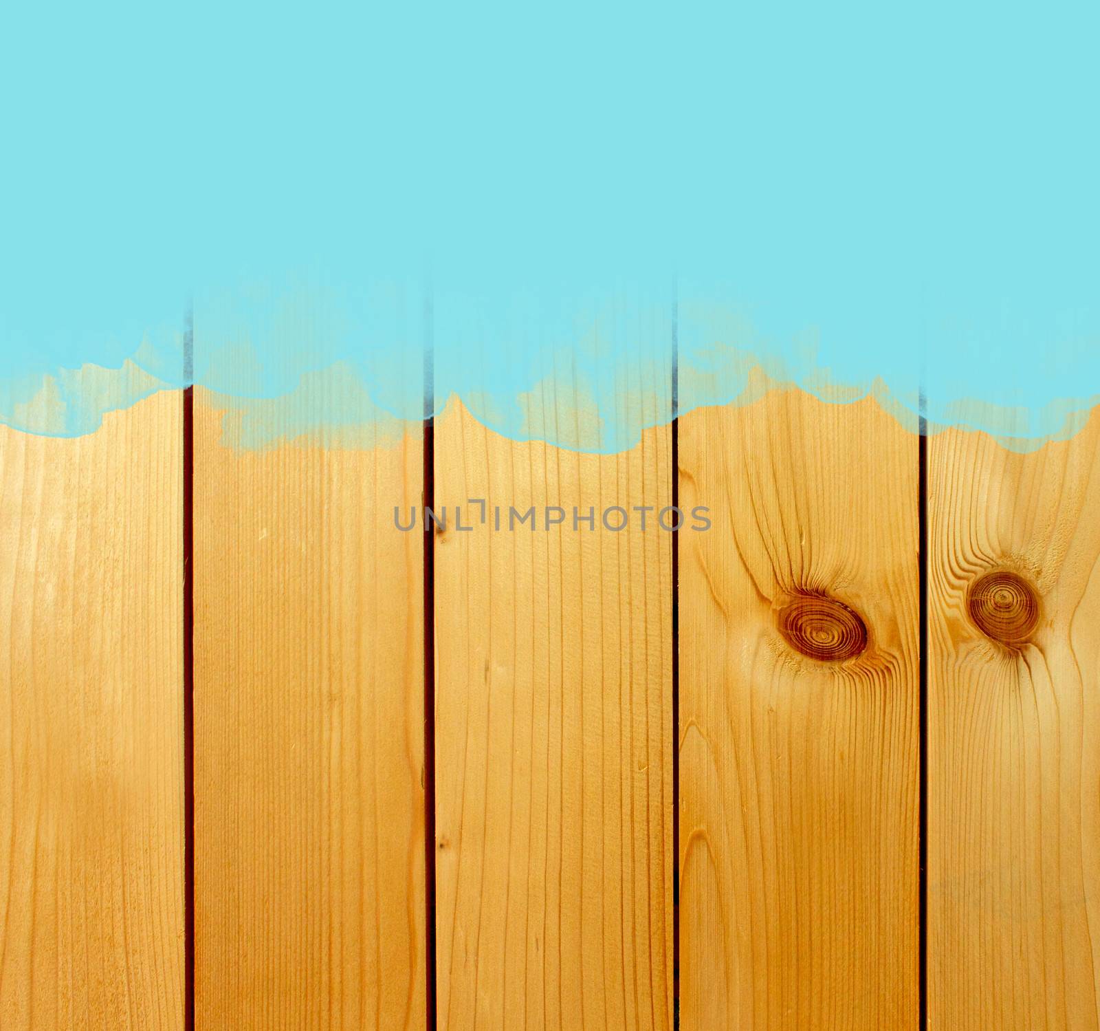 Blue stroke of the paint brush on wooden background  by nuchylee