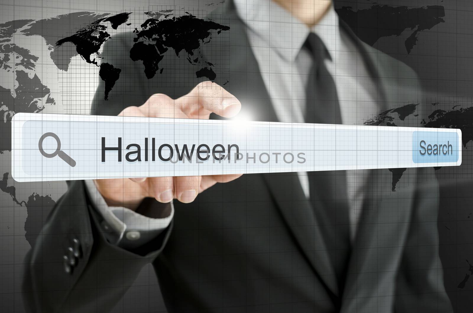 Word Halloween written in search bar on virtual screen.