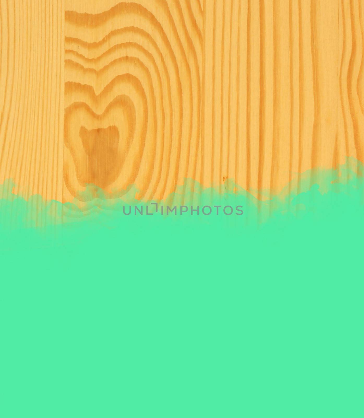 Green stroke of the paint brush on wooden background 