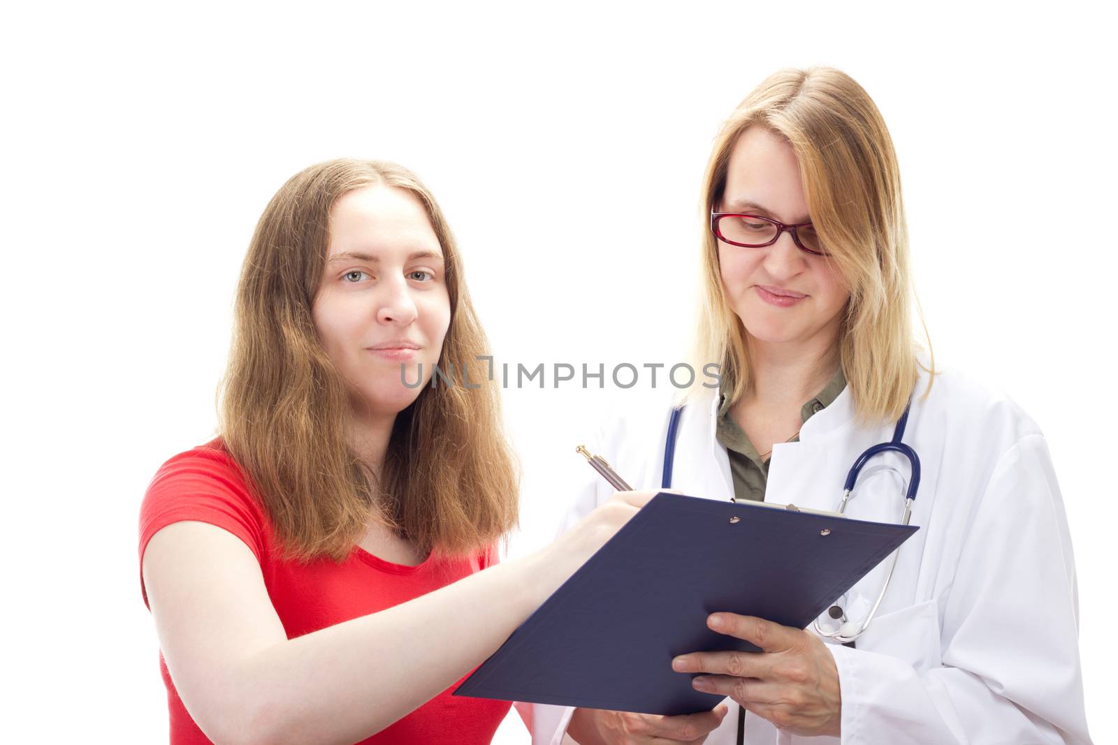 Young female patient signing agreement