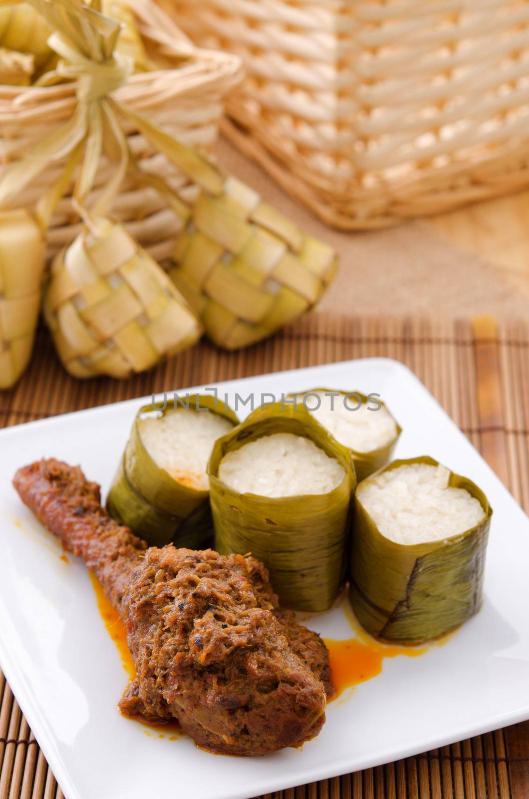 Lemak Lemang, traditional Malaysian food made of glutinous rice, coconut milk and salt. Cooked in a hollowed bamboo stick lined with banana leaves. Served during ramadan festival or hari raya.