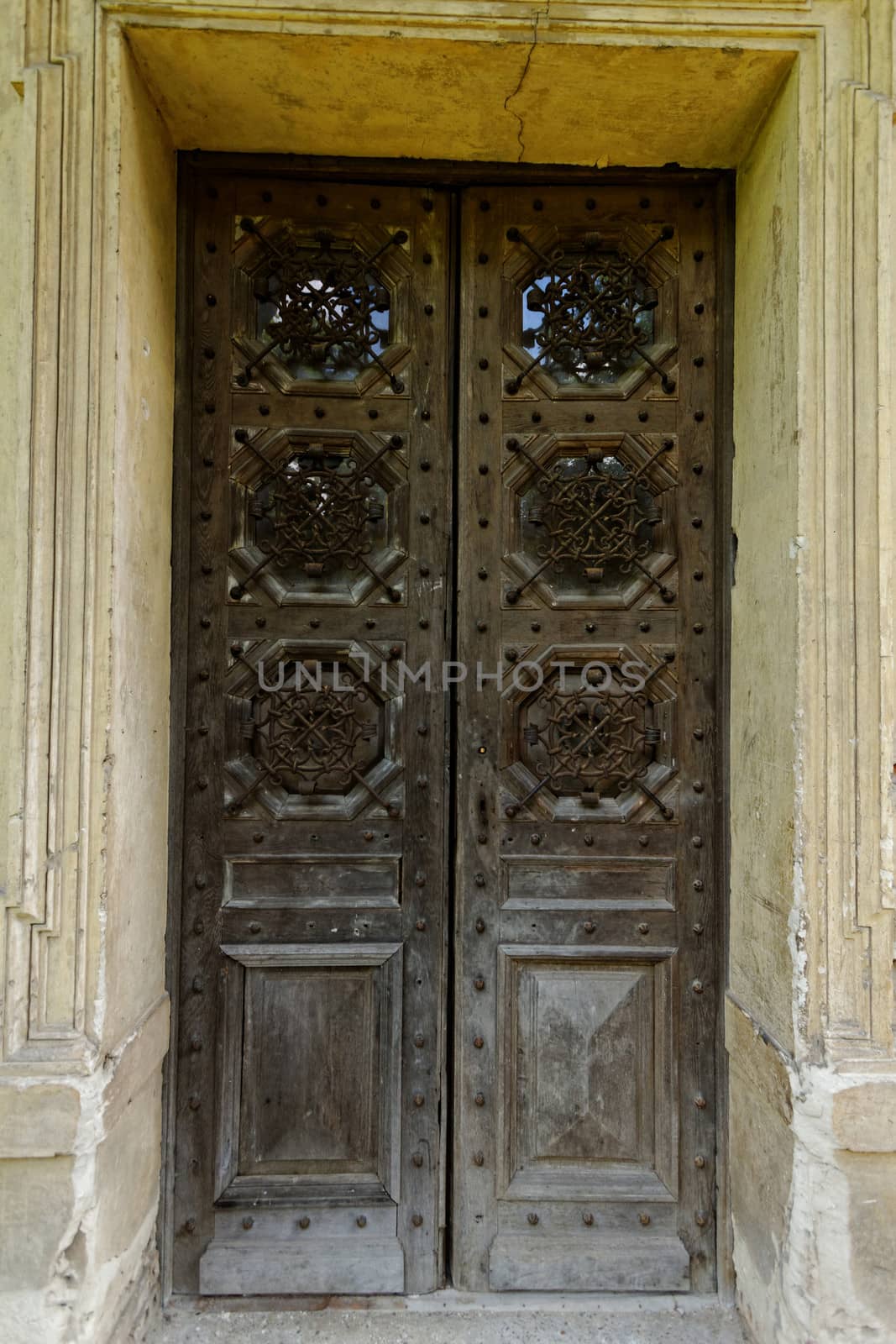 ancient wooden door on the old castle