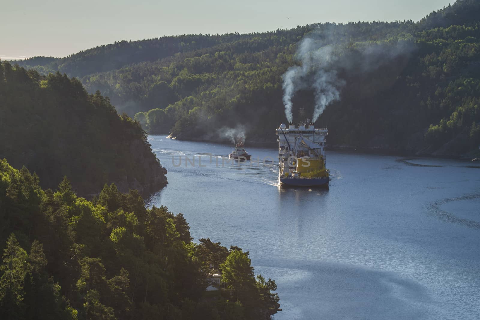 MV North Sea Giant are in the Ringdasfjord in Halden, Norway and waiting for two tugs that will tow the ship into open waters