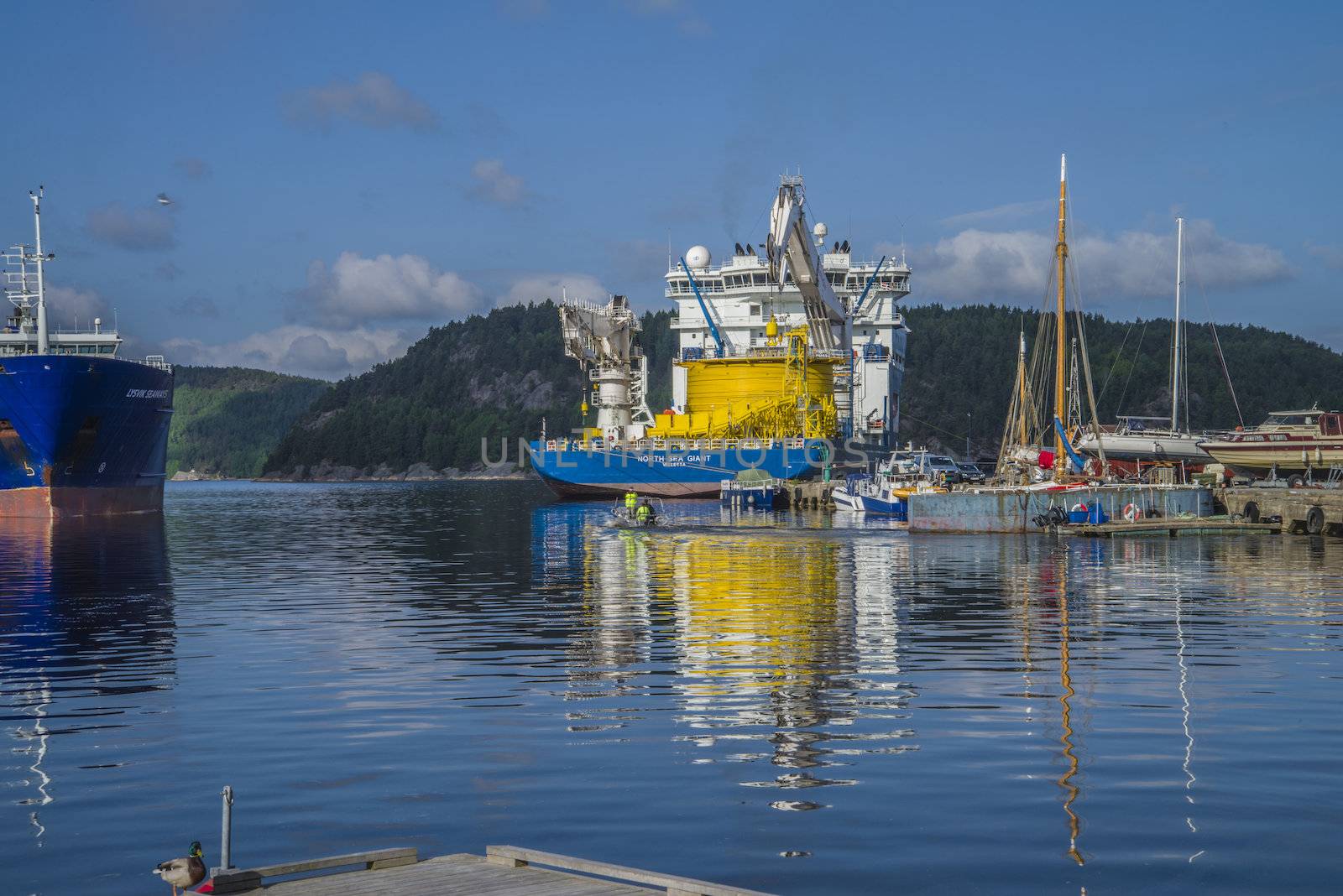 MV North Sea Giant is on hold at higher water levels and then being towed out of Ringdalsfjord. Some facts about the ship: Ship Type: Offshore supply ship, Length x Breadth: 161 m X 30 m, Gross Tonnage: 18151, DWT (deadweight tons): 12460 t, Flag: Malta.