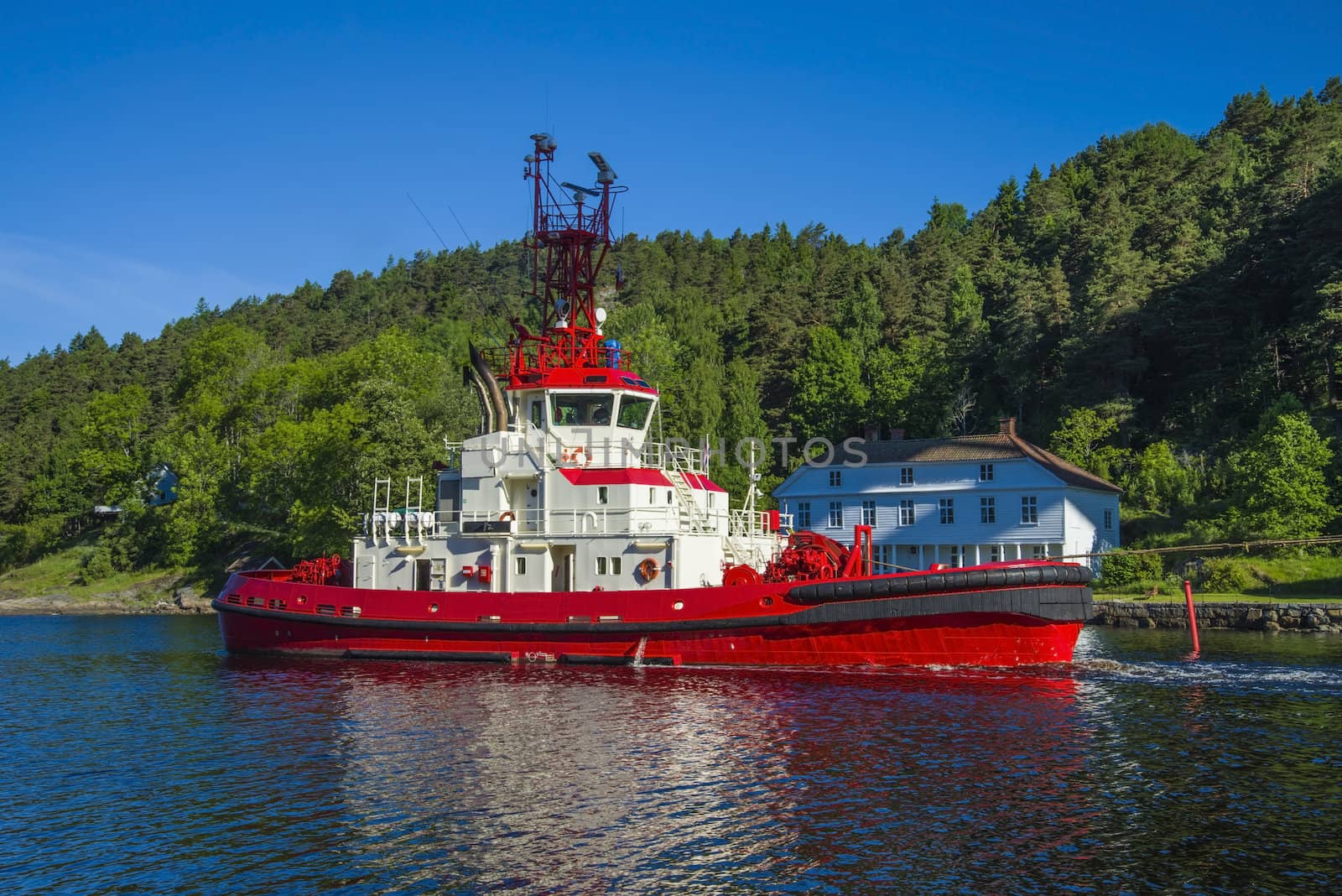 Tug Achilles and tug Belos have started towing the MV North Sea Giant through Ringdalsfjord in Halden, Norway.