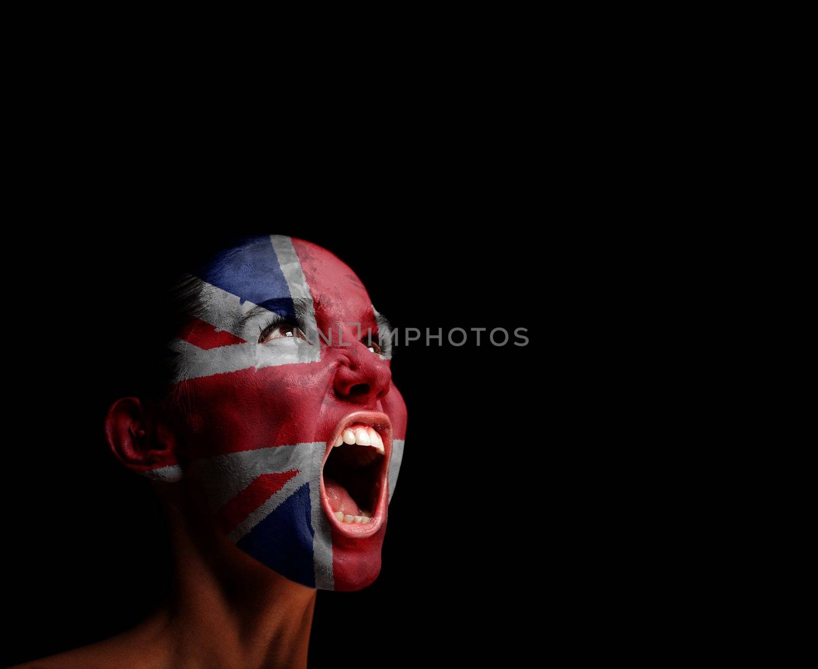 The British flag on the face of a screaming woman. concept