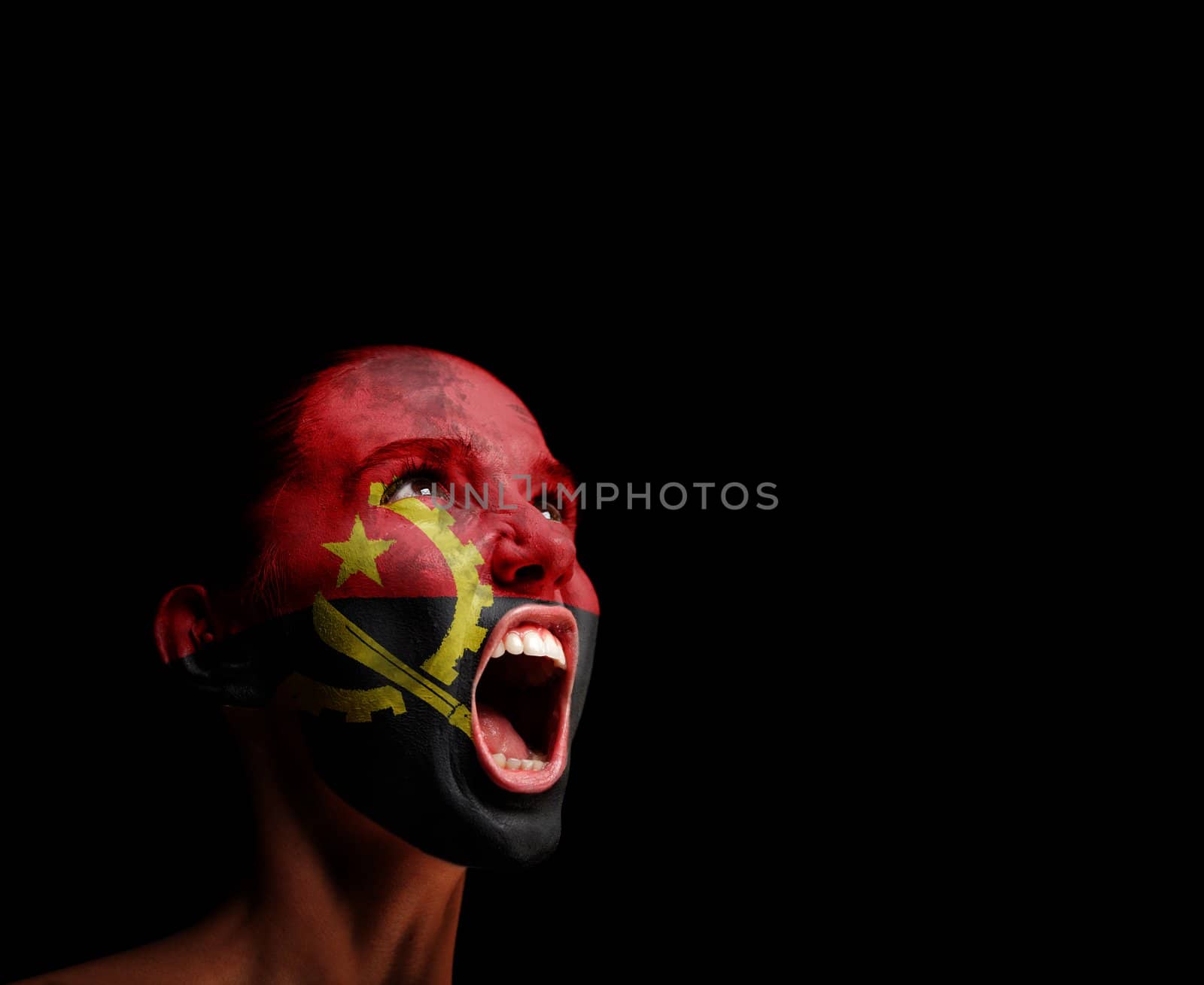 The Angolan flag on the face of a screaming woman. concept