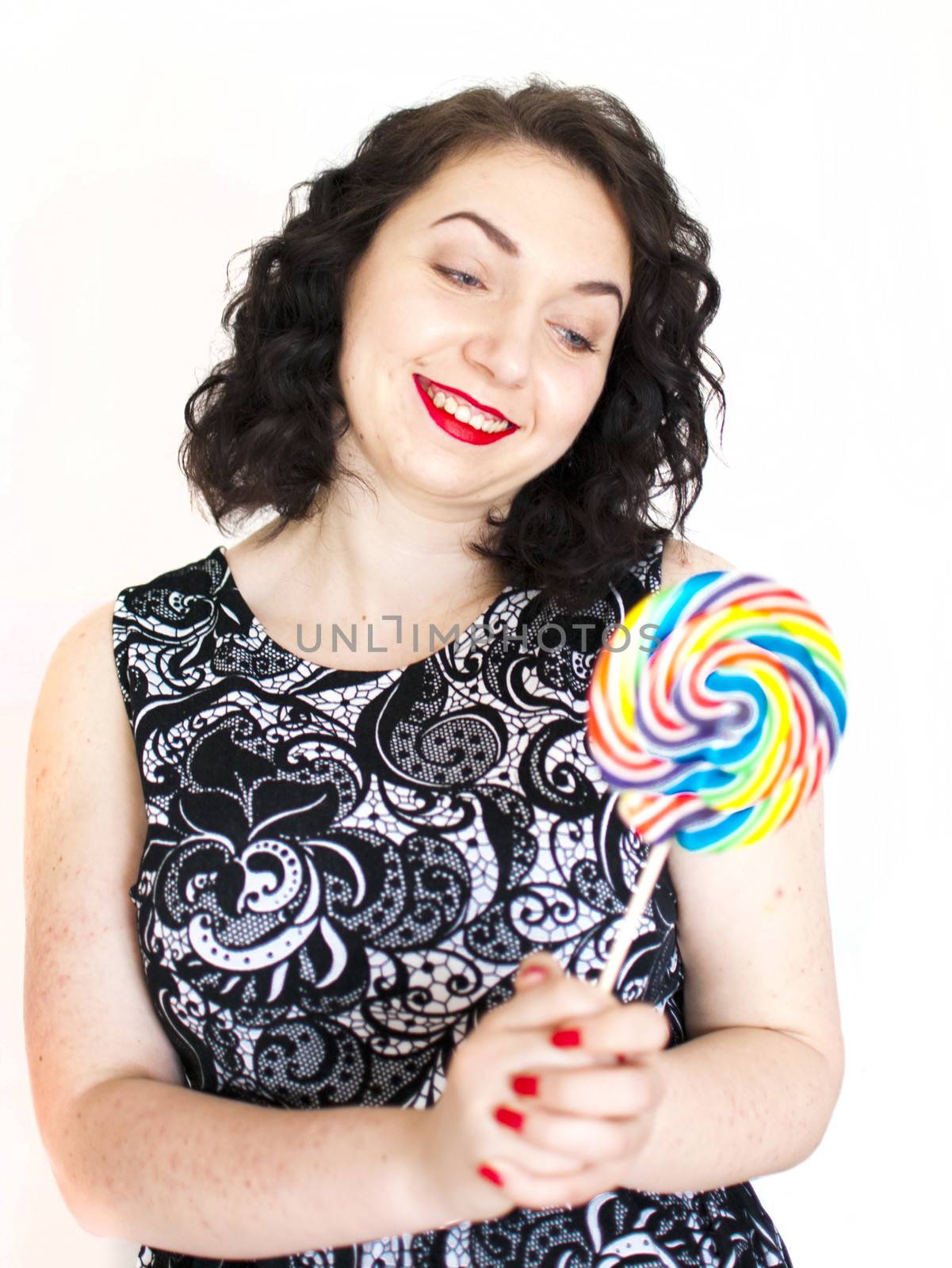 beautiful retro girls portrait with colorful lollipop