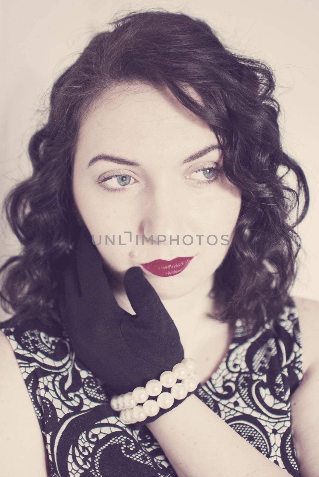 beautiful retro girl portrait in vintage style dress