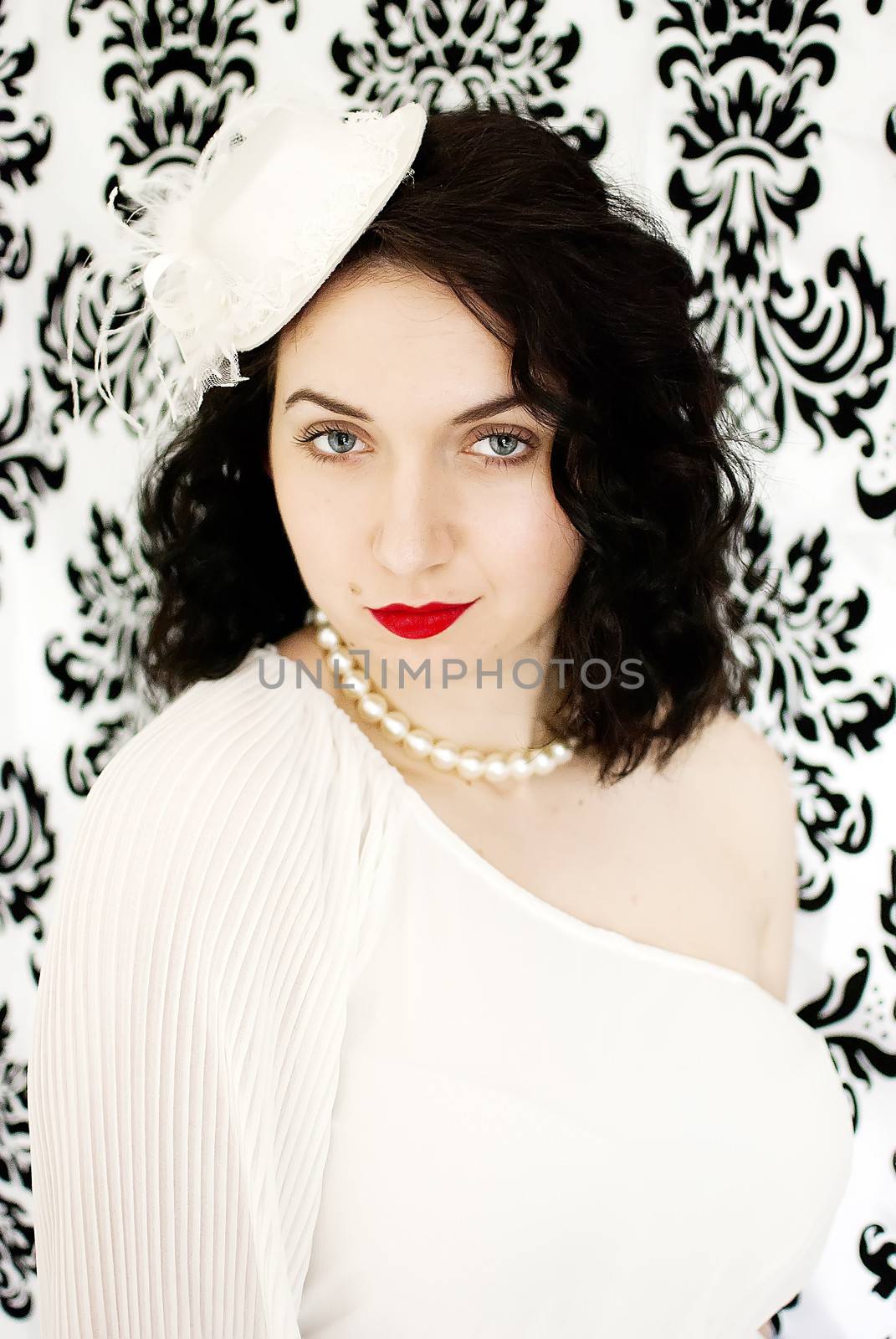 beautiful retro girl portrait in vintage style dress