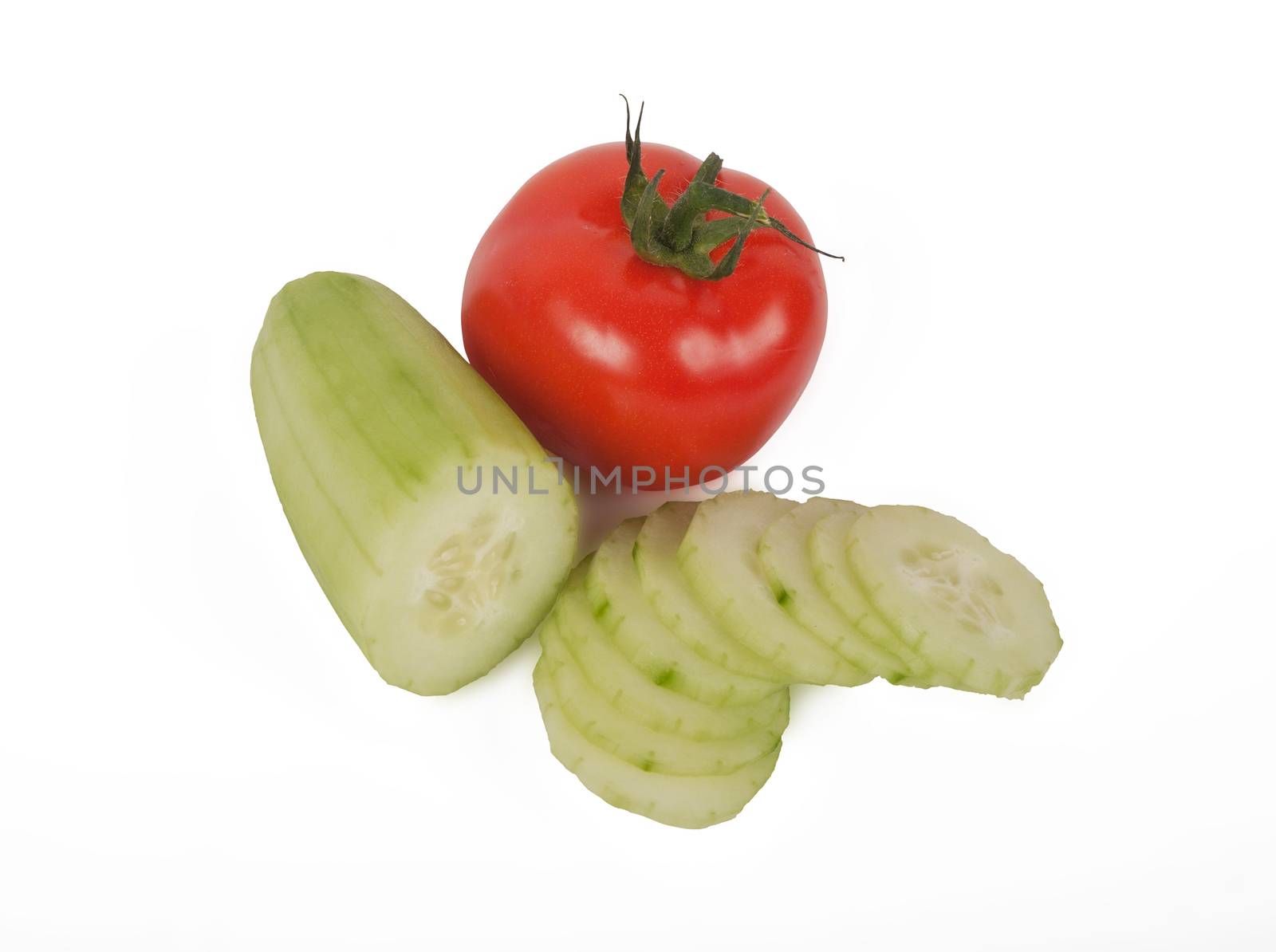 sliced cucumber and tomato isolated on white background