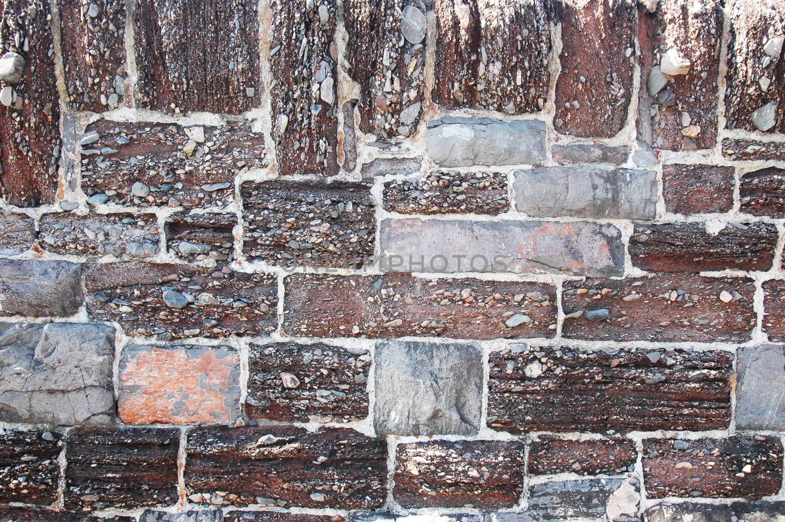 Wall stone texture on the beach