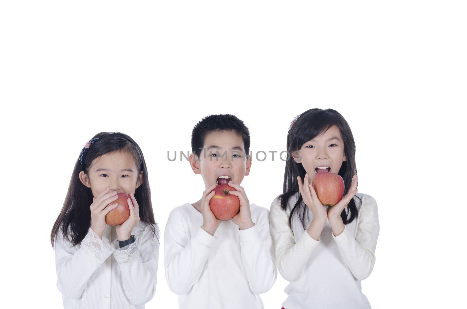 Three cute children eating an apples by FrankyLiu