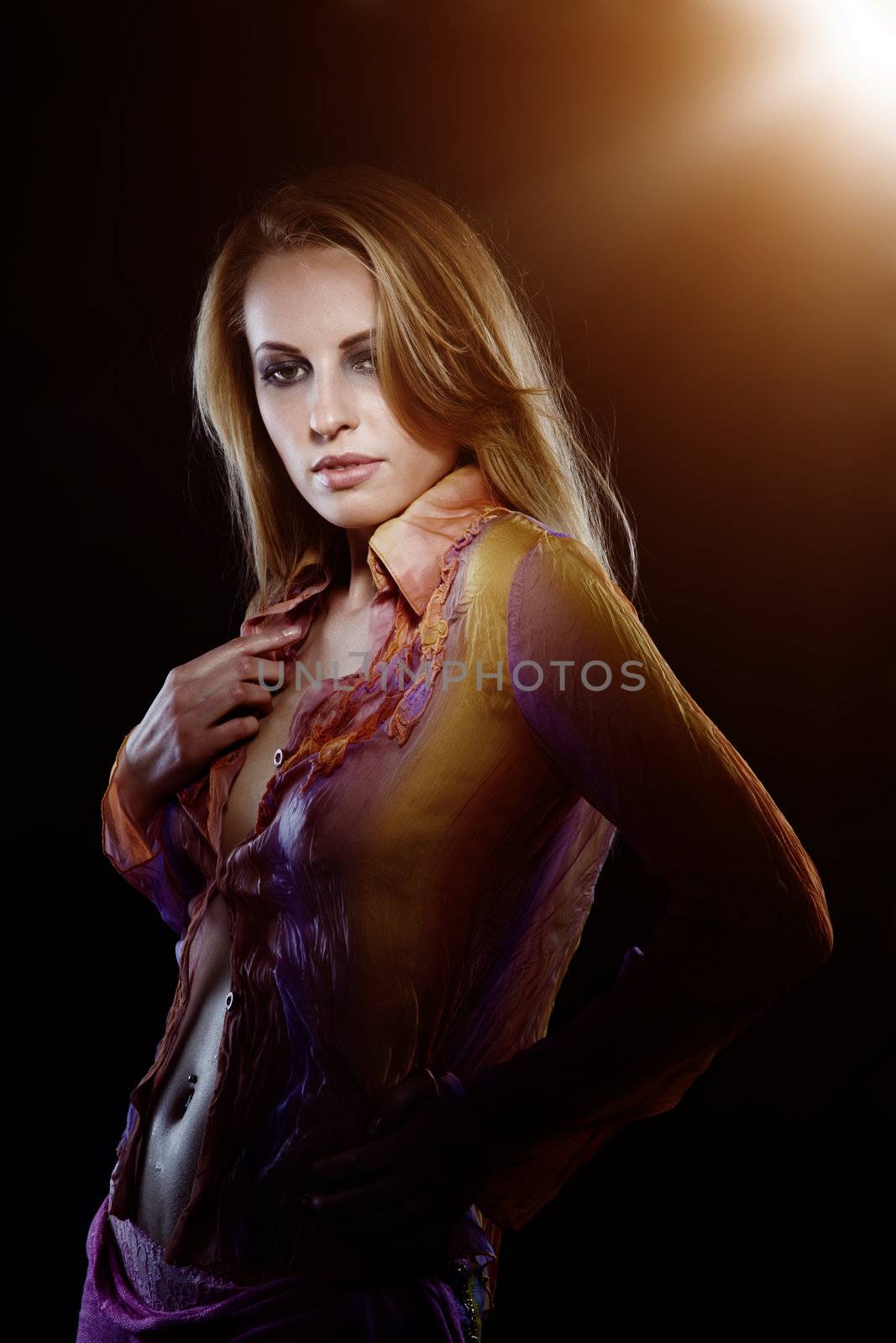 Glamourous lady in the studio with backlight