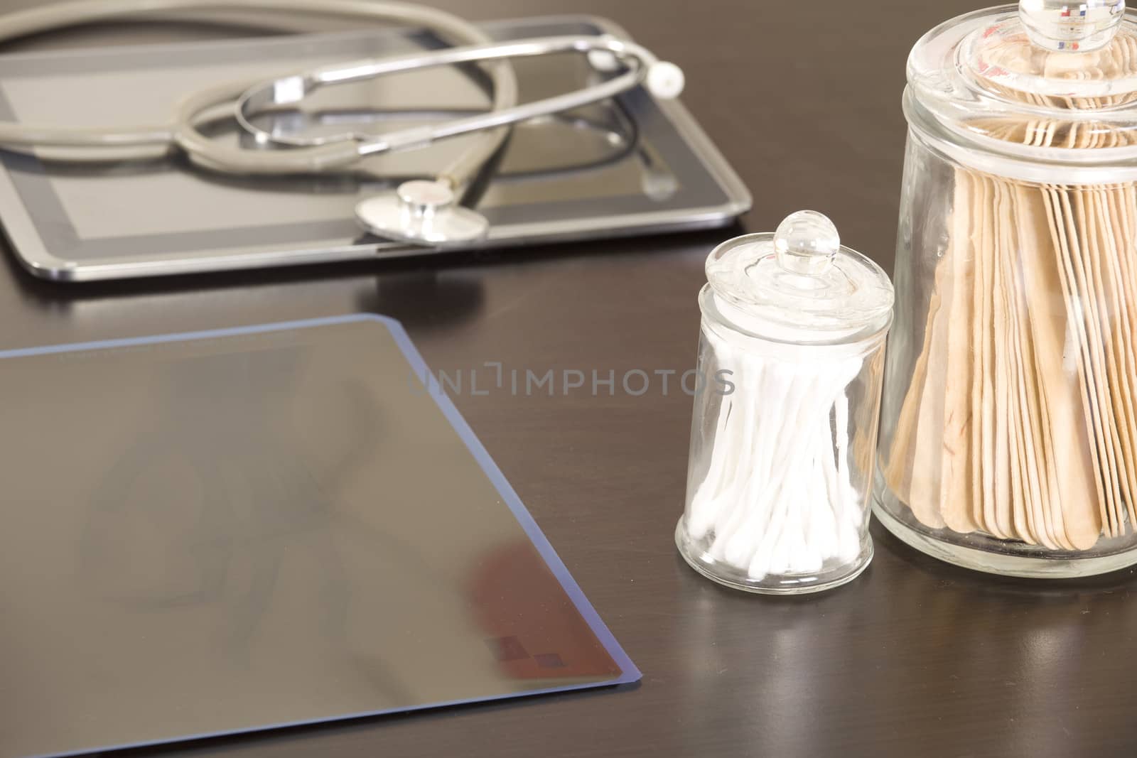 Doctor workplace with digital tablet and stethoscope by senkaya