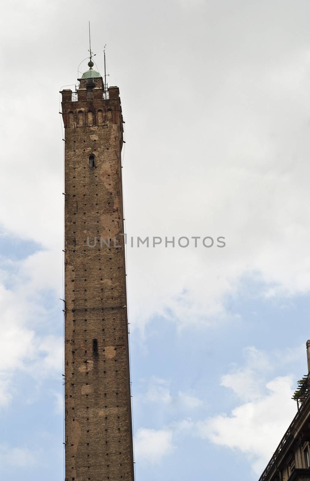 View from the street to the Asinelli Tower in Bologna, Italy.