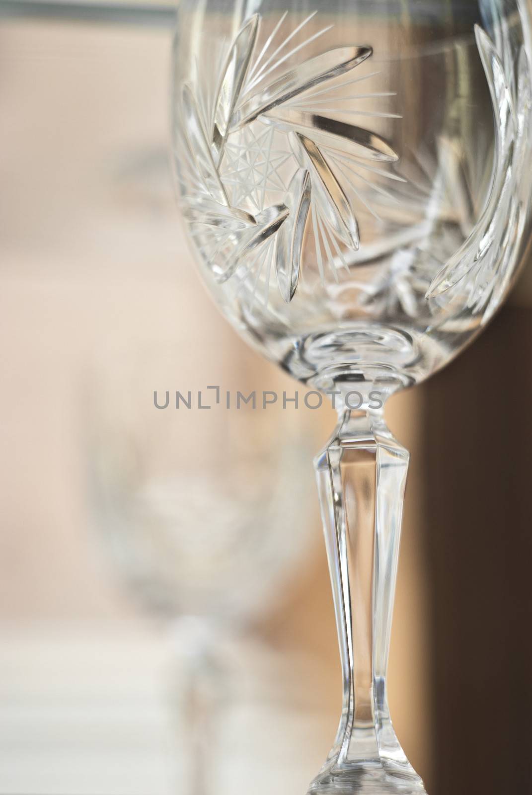Detail of old crystal wineglass