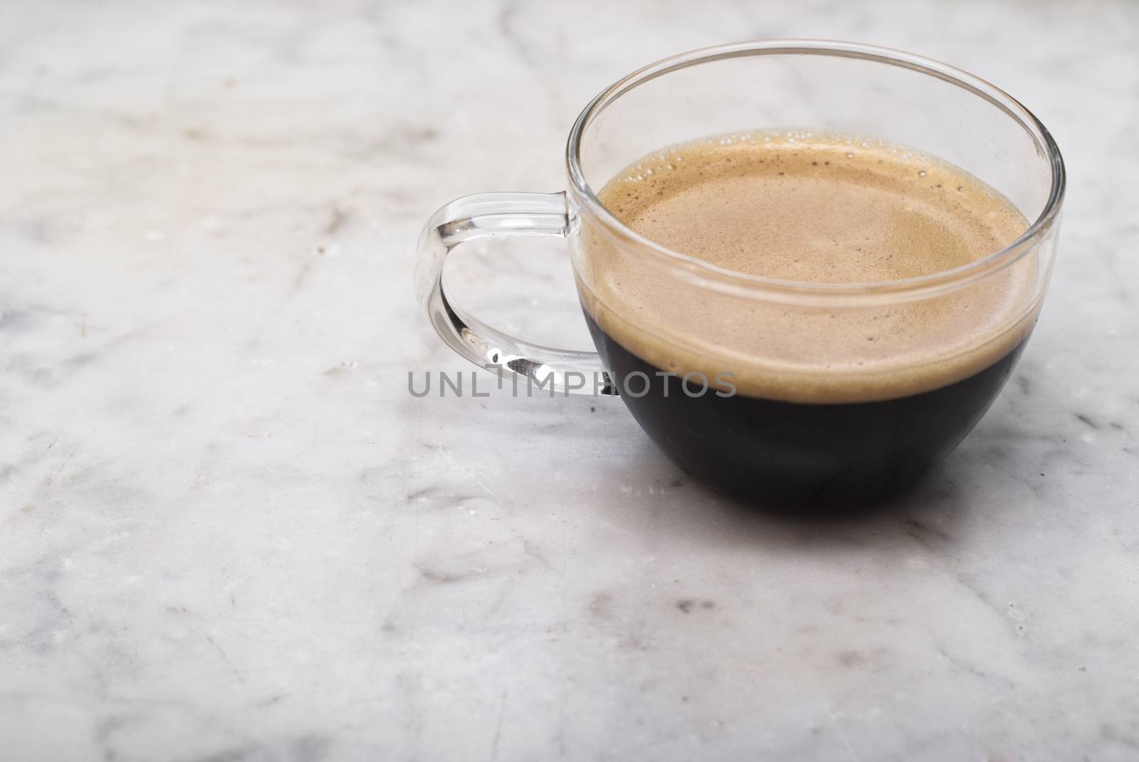 cup of italian coffee isolated on white marble background