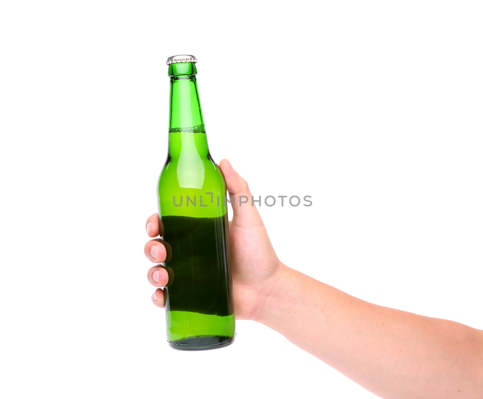 A hand holding up a green beer bottle without label over a white background vertical format