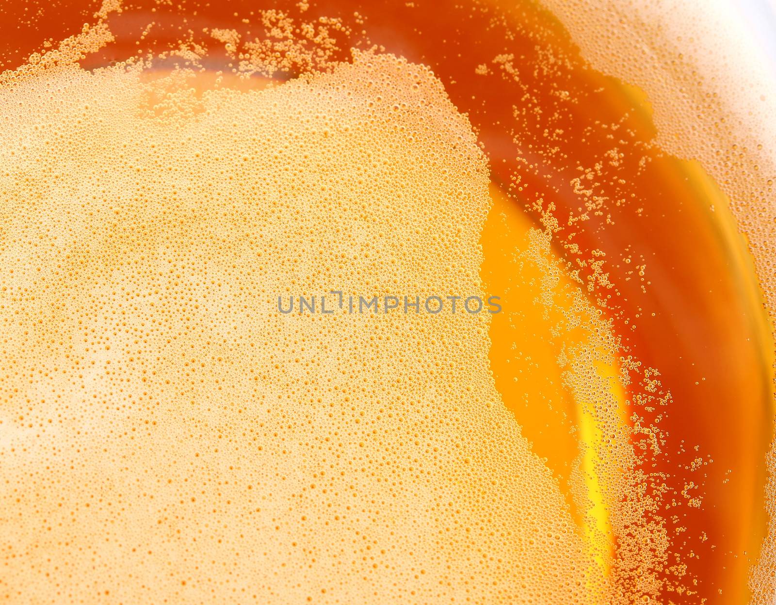 Glass of beer, top view close-up. by indigolotos