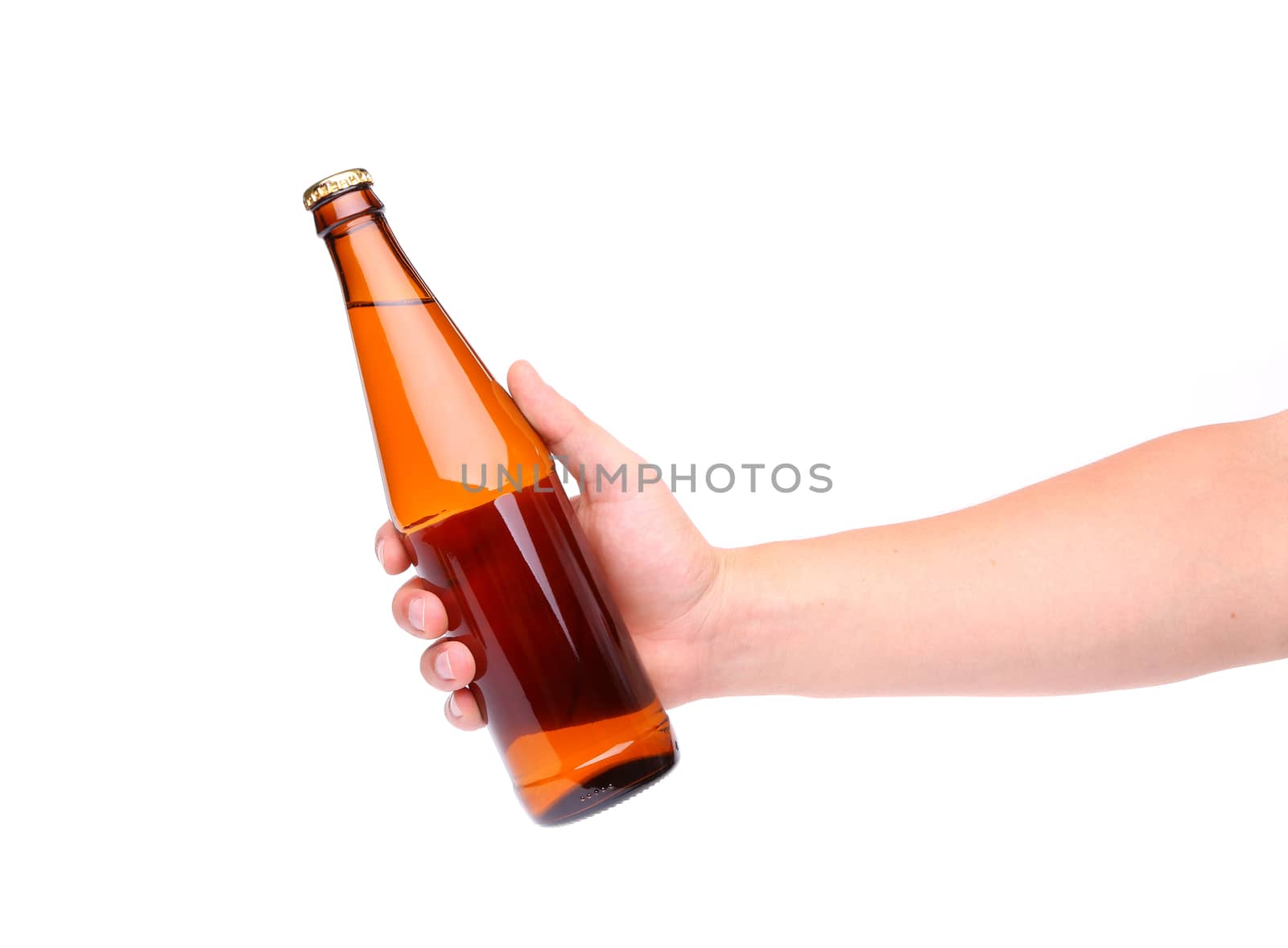 A hand holding up a yellow beer bottle by indigolotos