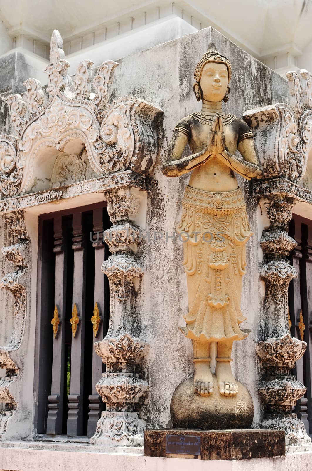 Buddha sculptures in an ancient buddhist wat in Thailand