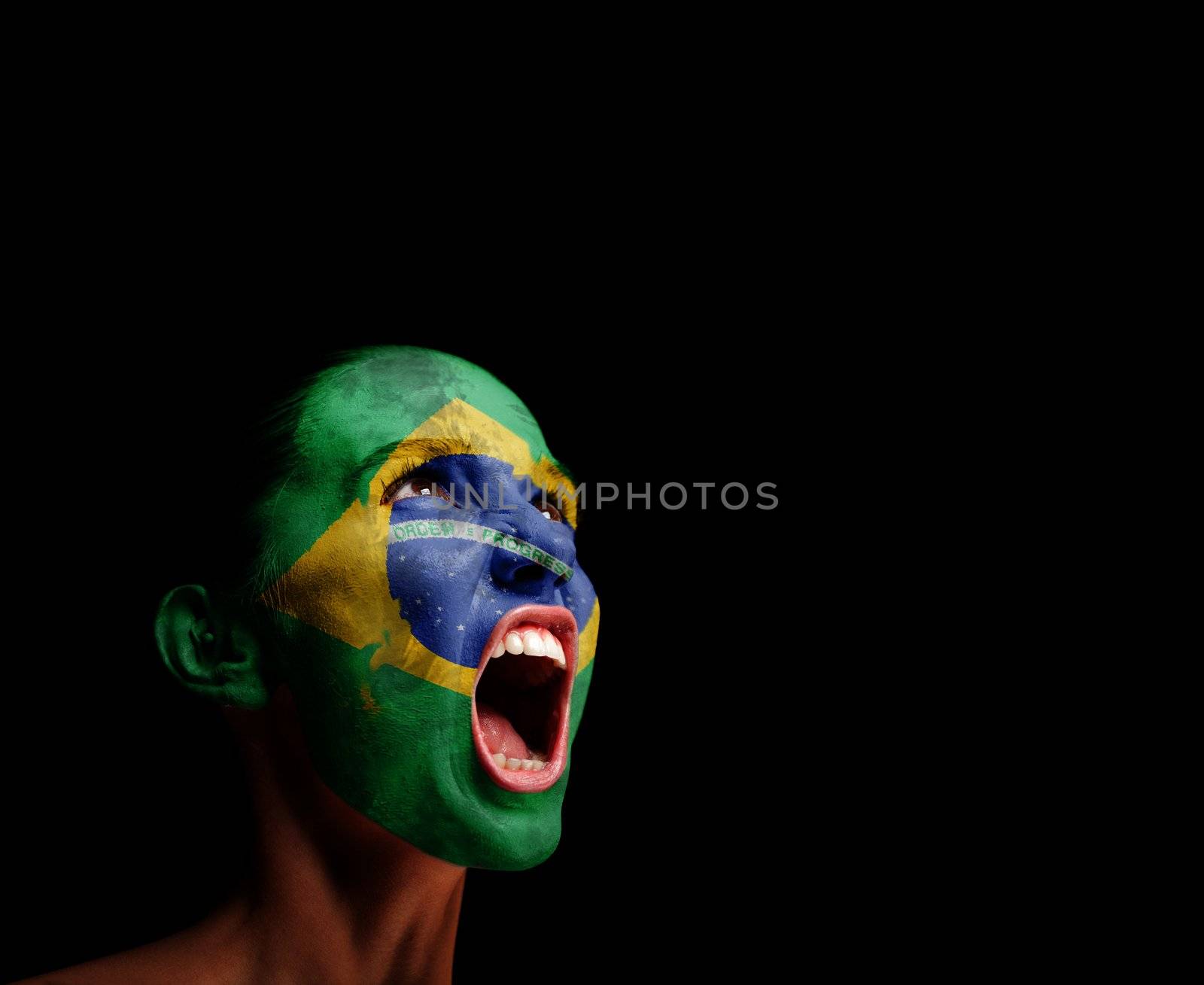 The Brazilian flag on the face of a screaming woman. concept