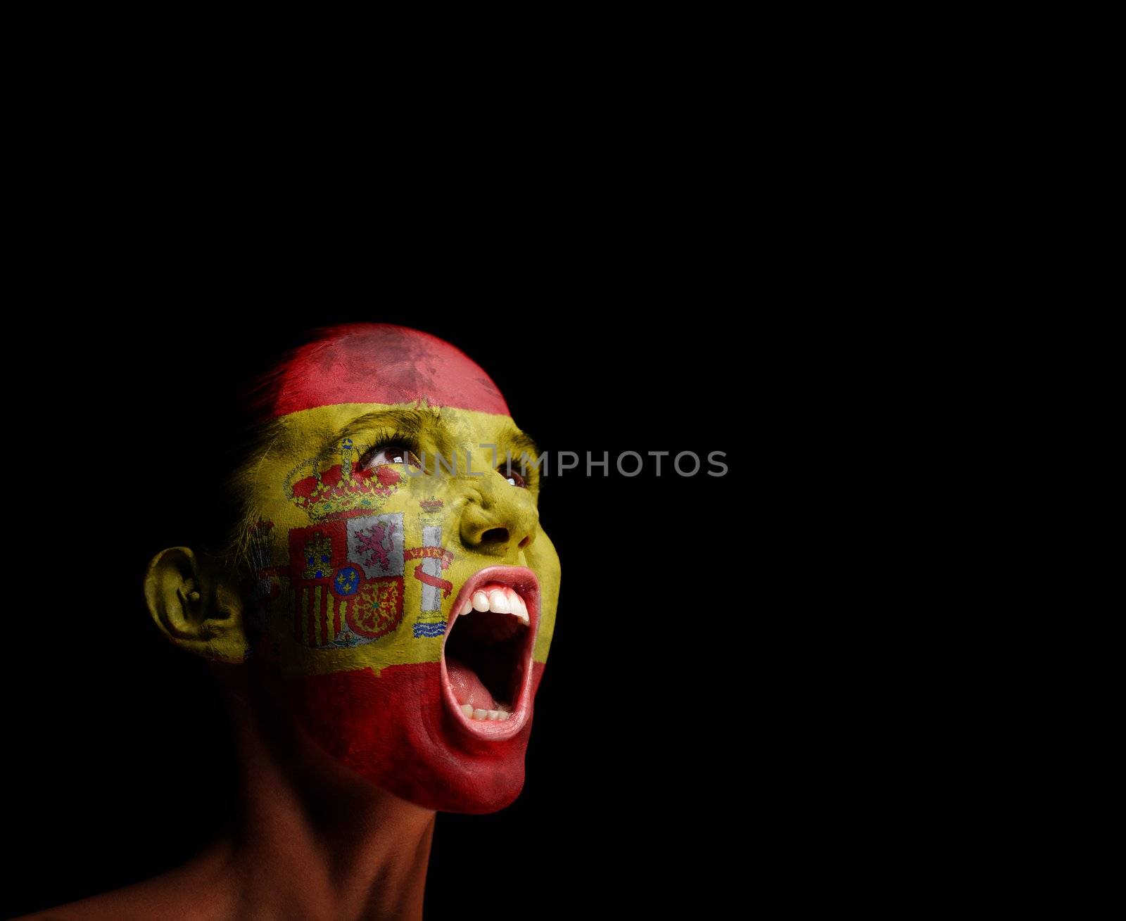 The Spanish flag on the face of a screaming woman. concept