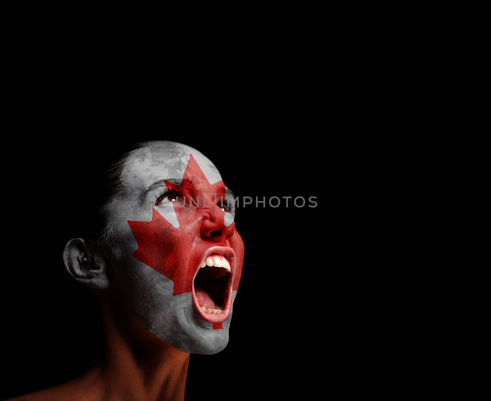 The Canadian flag on the face of a screaming woman. concept