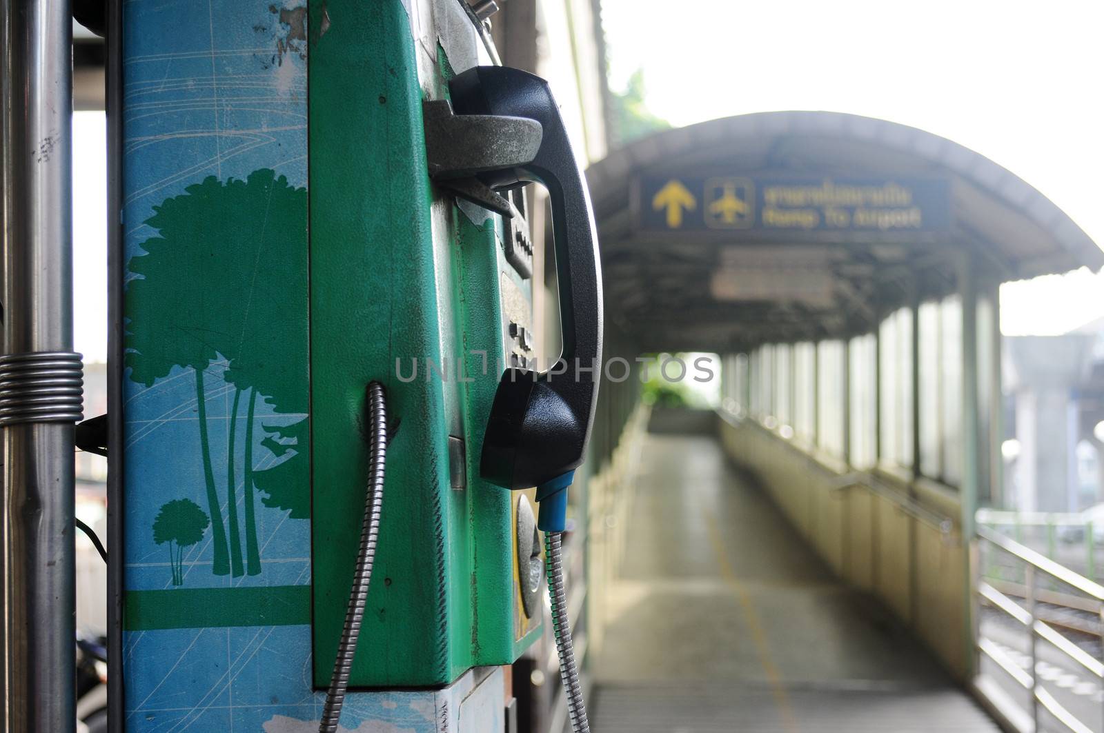 Old public telephone kiosk at Don Mueang Airport in Thailand 