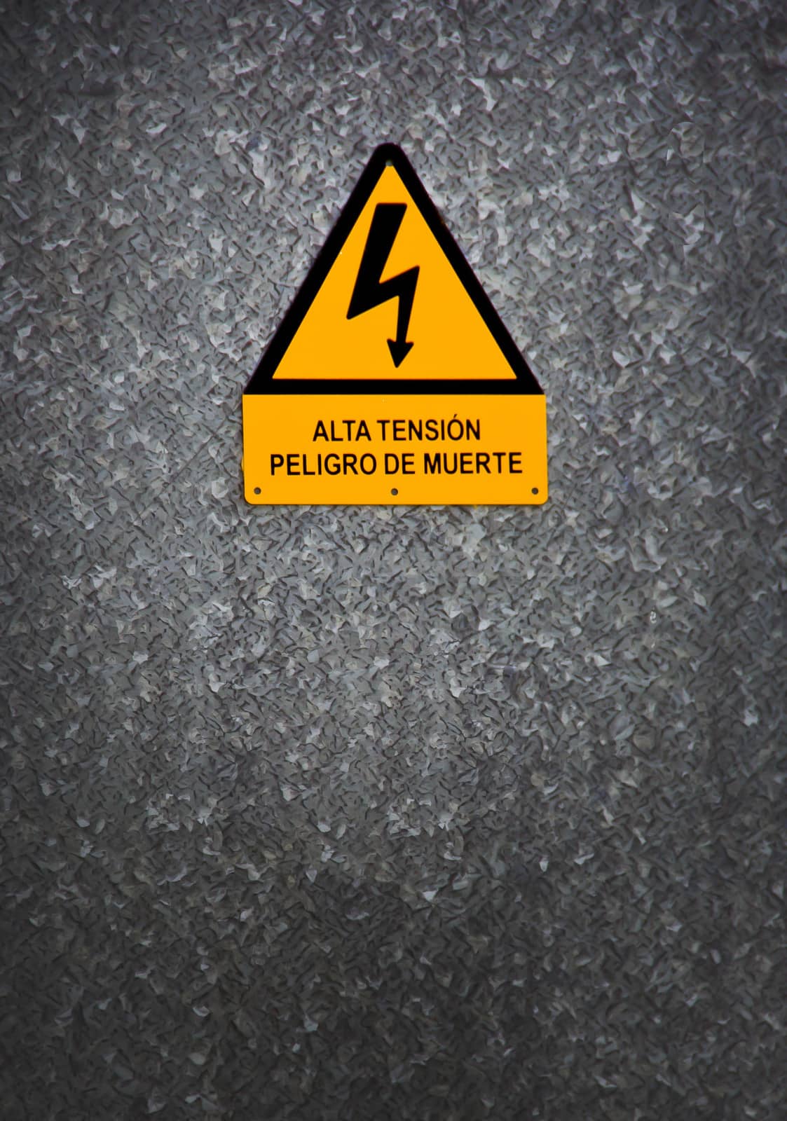 warning sign on gray background in Asturias, Spain
