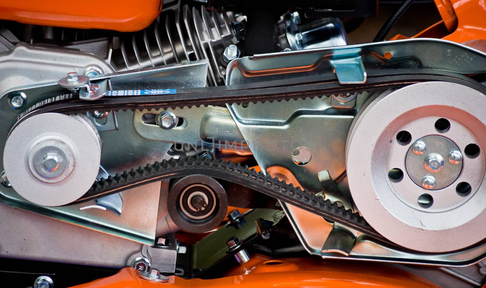detail of a motorcycle with orange and plate colors
