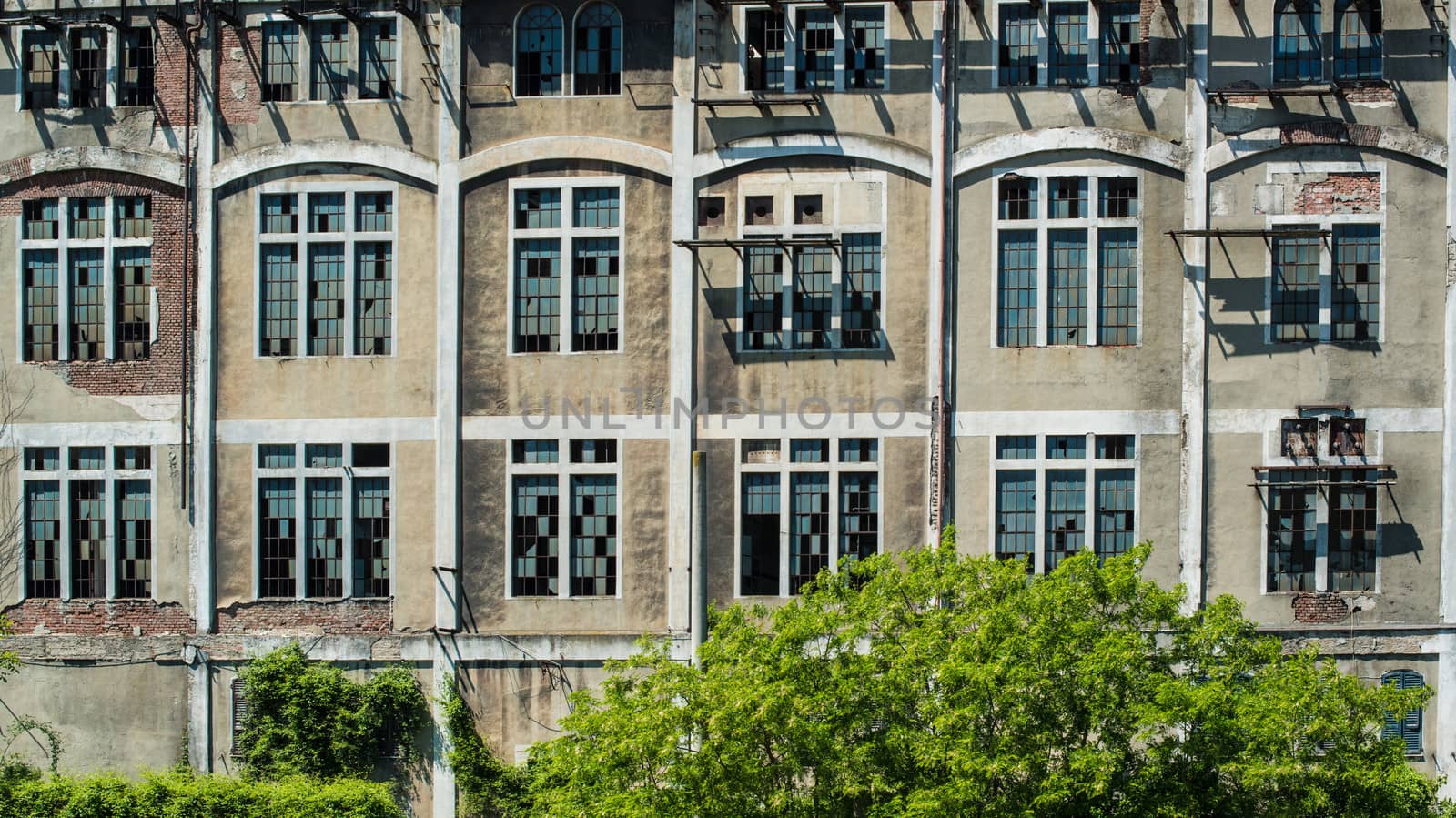 Facade of an old factory in Liguria, Italy