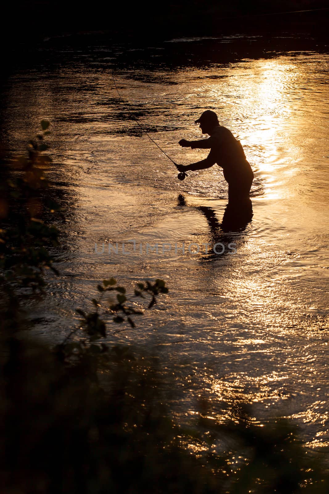 fisherman on the rive