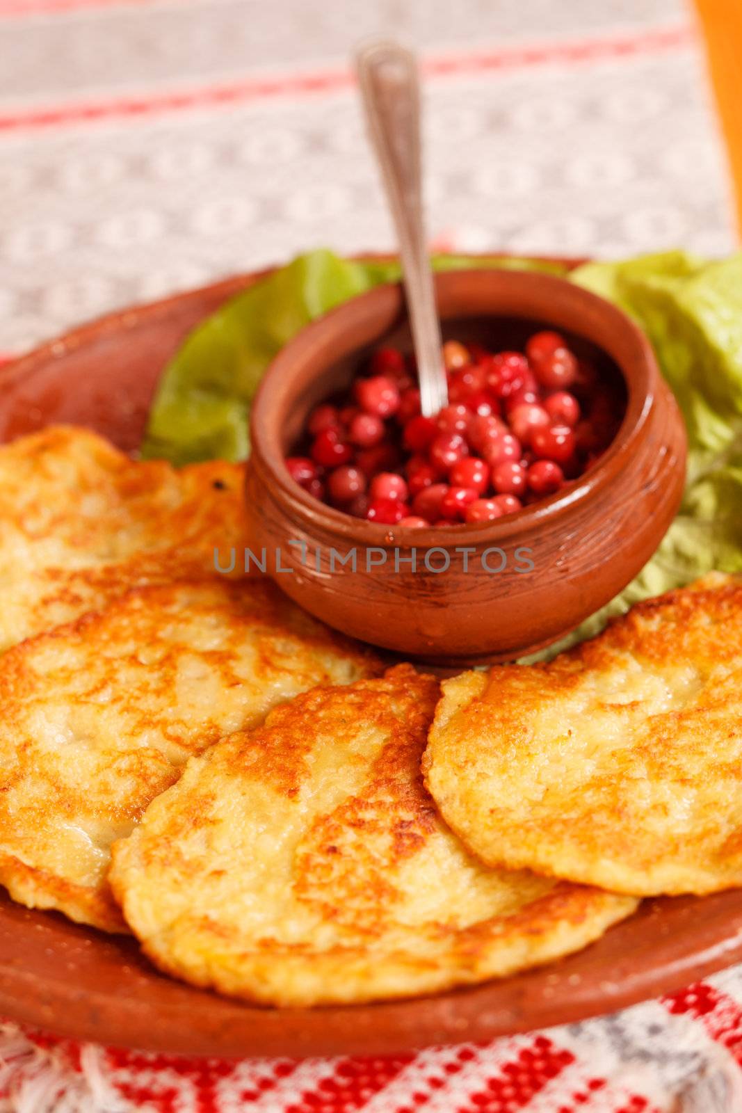 potato pancakes with cranberry sauce