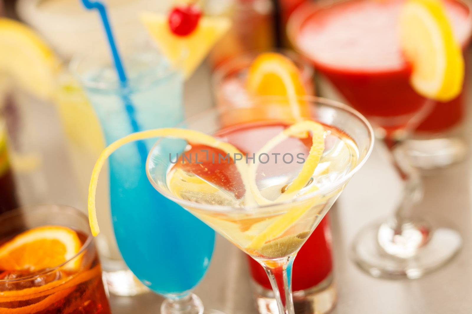 Colorful cocktails close up by shebeko