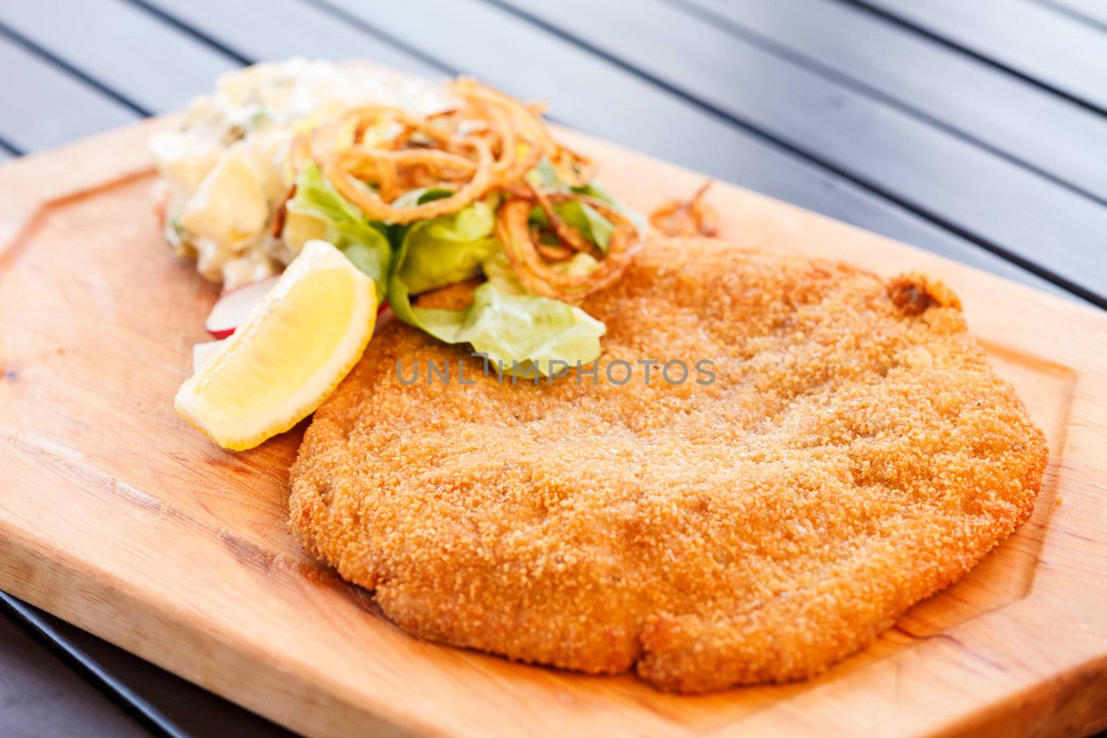 Schnitzel with salad by shebeko
