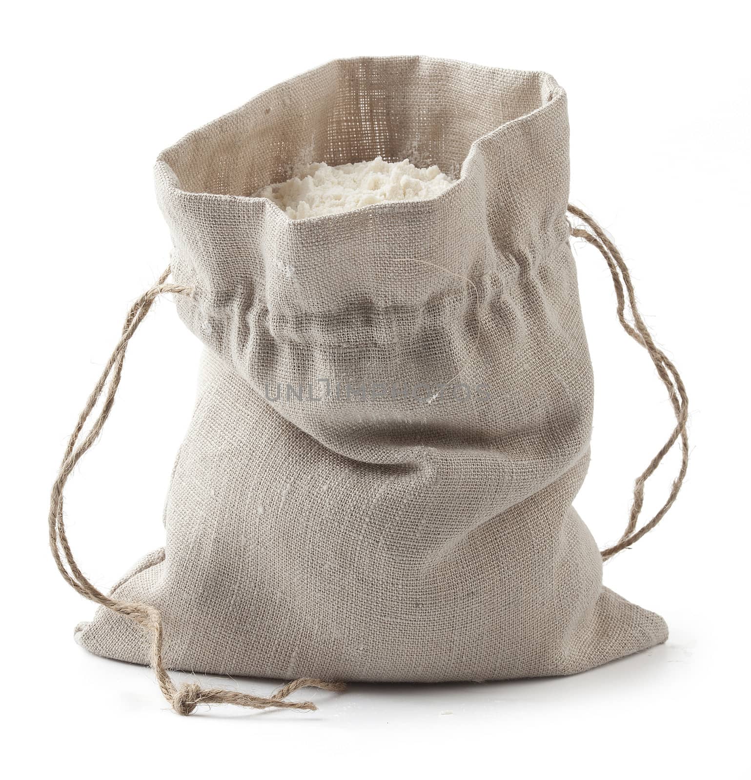 Isolated small sack with white flour on the white background