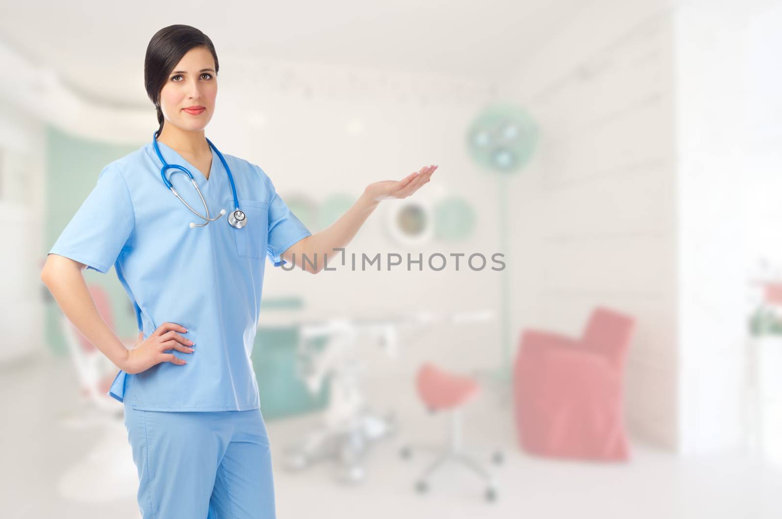 Young doctor shows welcome gesture at medical office