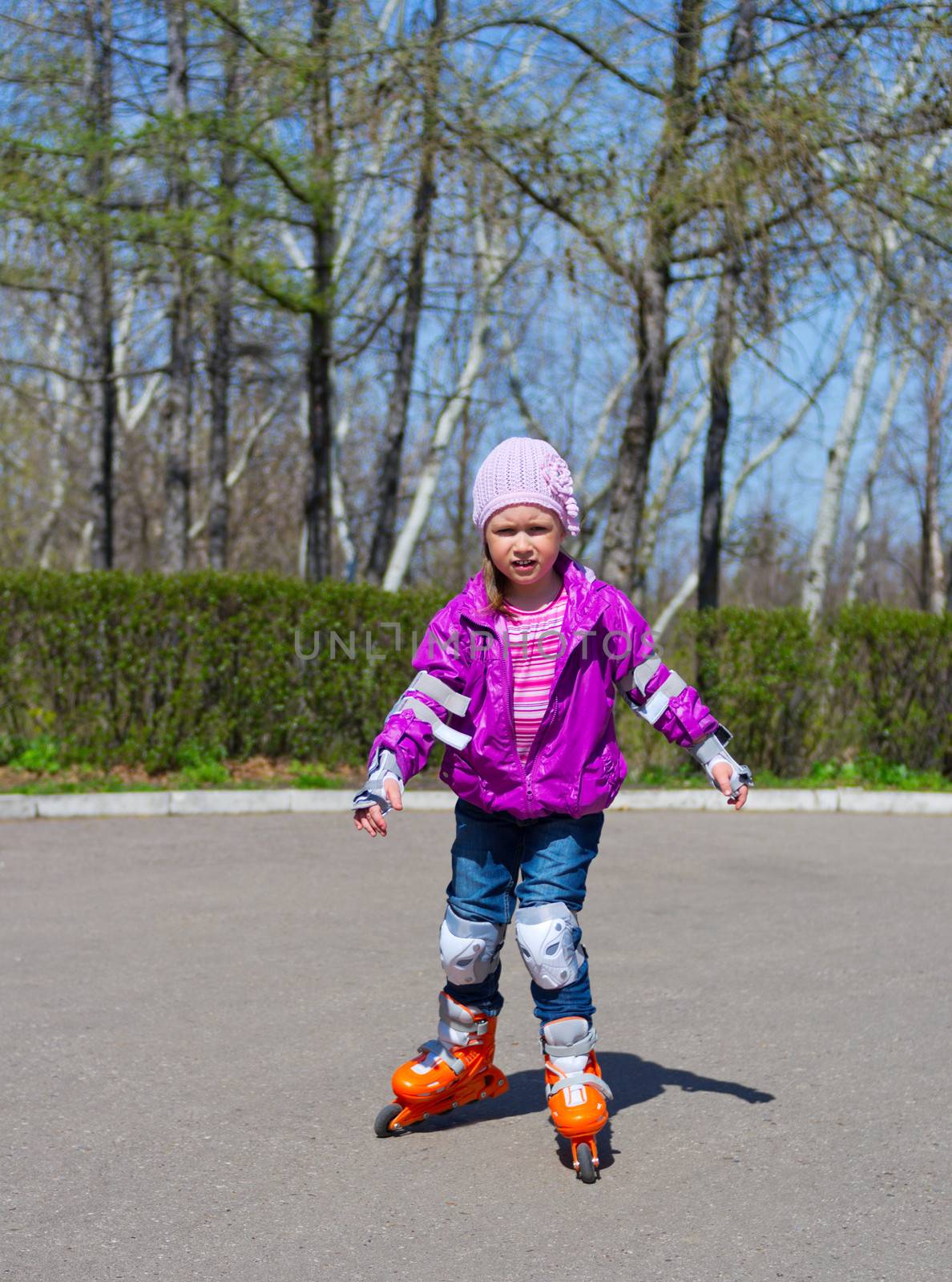 Little girl skating on roller skates by rbv