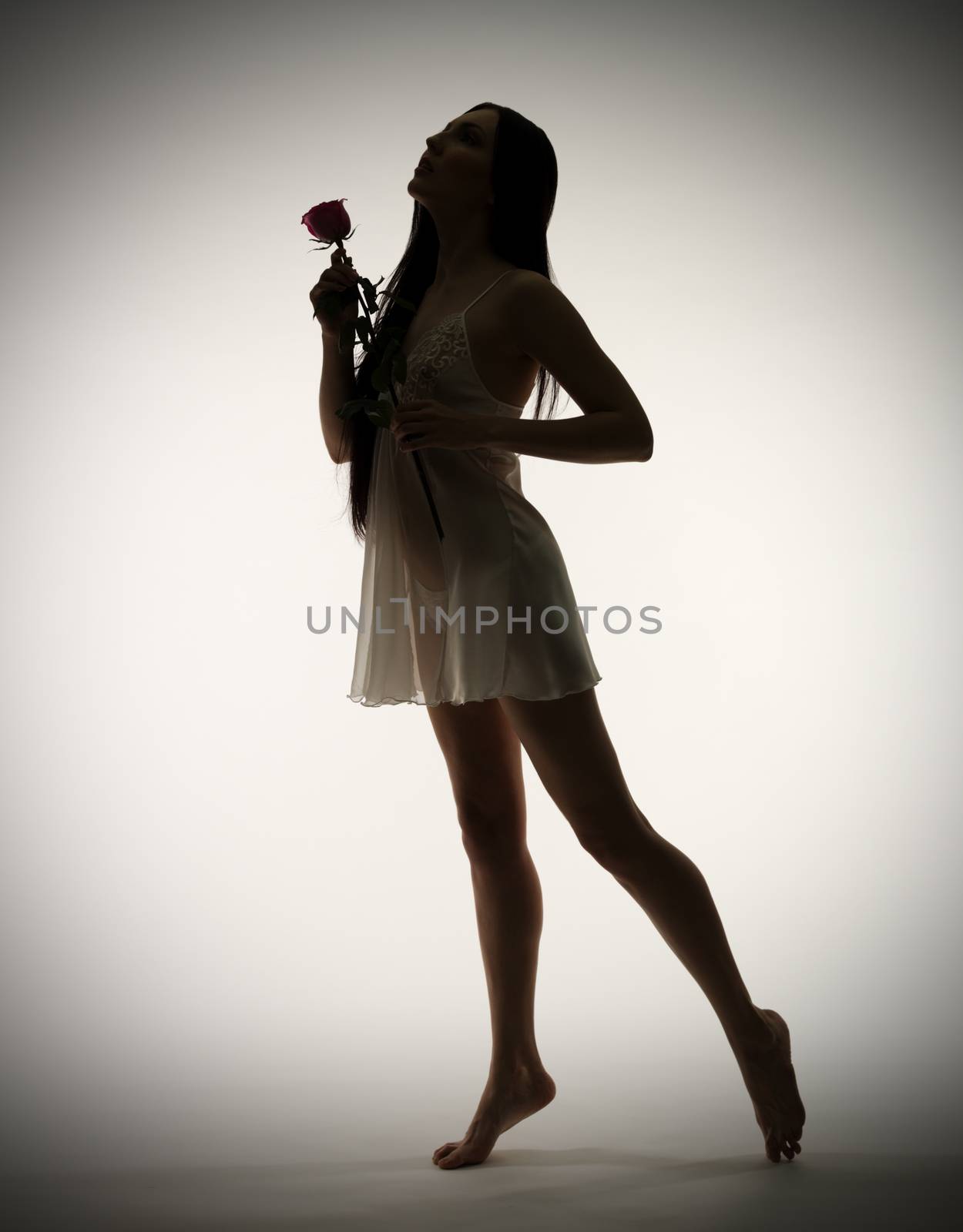 Portrait of young girl with rose flower by rbv